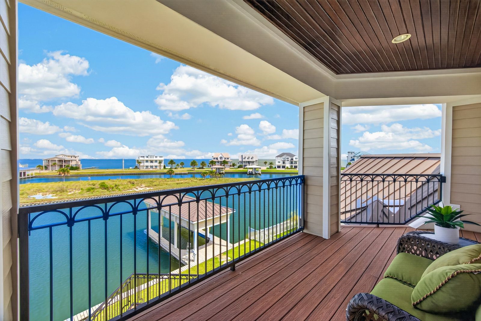 Enjoy breathtaking water views from the second-floor balcony, perfect for soaking up the sun on a beautiful day.