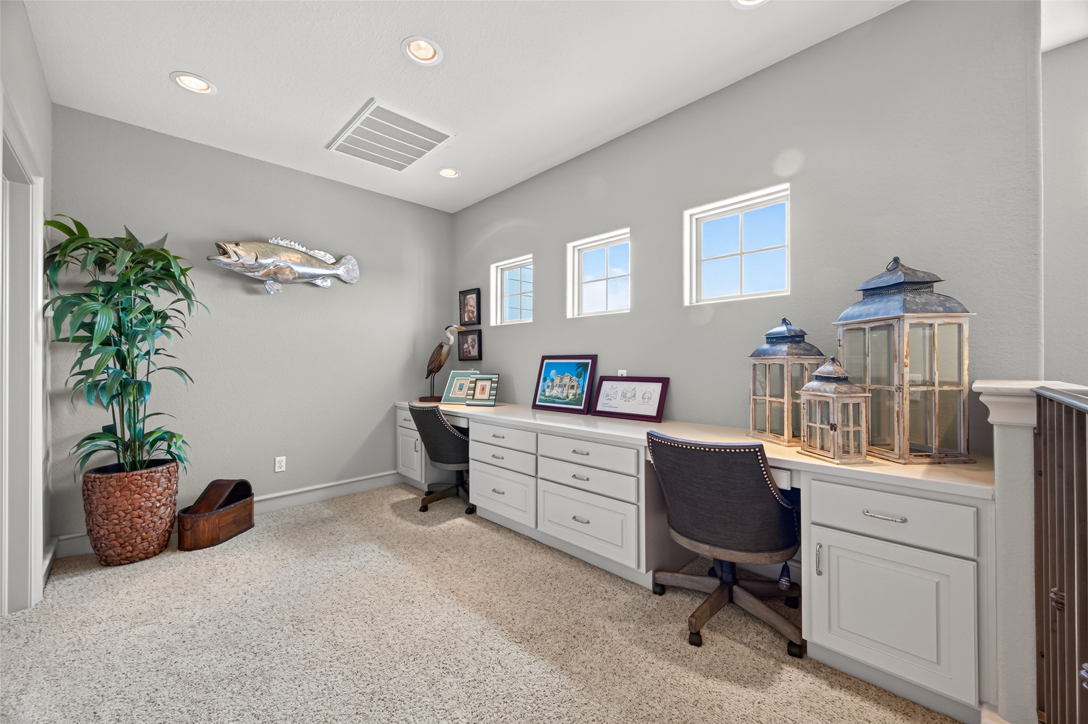 Upstairs landing features a versatile built-in desk, perfect for dual home office setups.