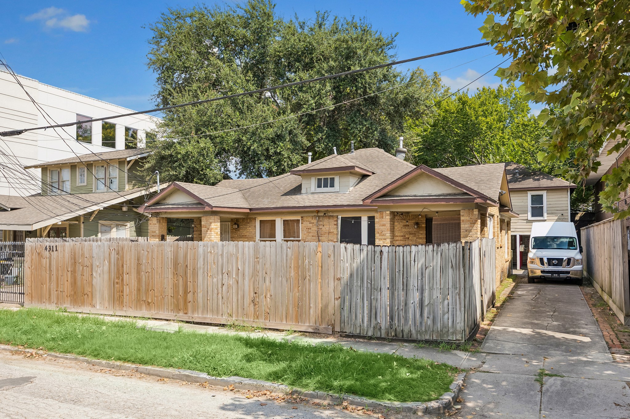 A private driveway leads to three parking space.