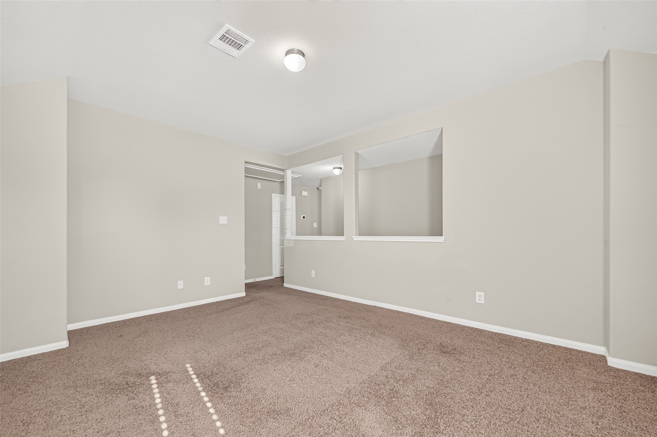 Another view of the game room, offering a versatile space for relaxation or entertainment.