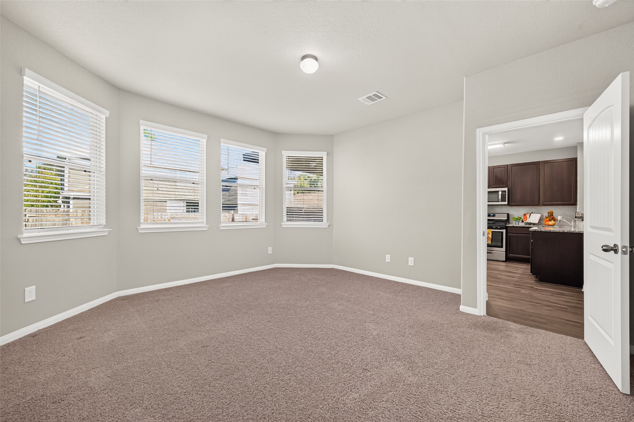 Multiple windows allowing natural light! Sitting nook.