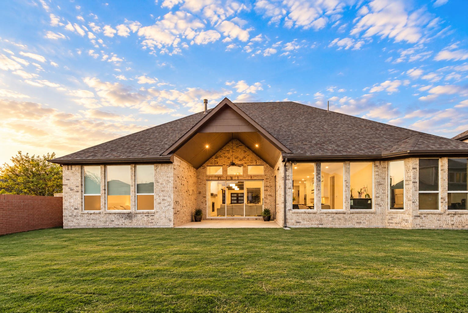 Stunning modern home with expansive windows, beautiful brick exterior, and a spacious backyard, perfect for enjoying serene sunsets. Don't overlook the sliding doors that will unite the 2 atmosphere seamlessly
