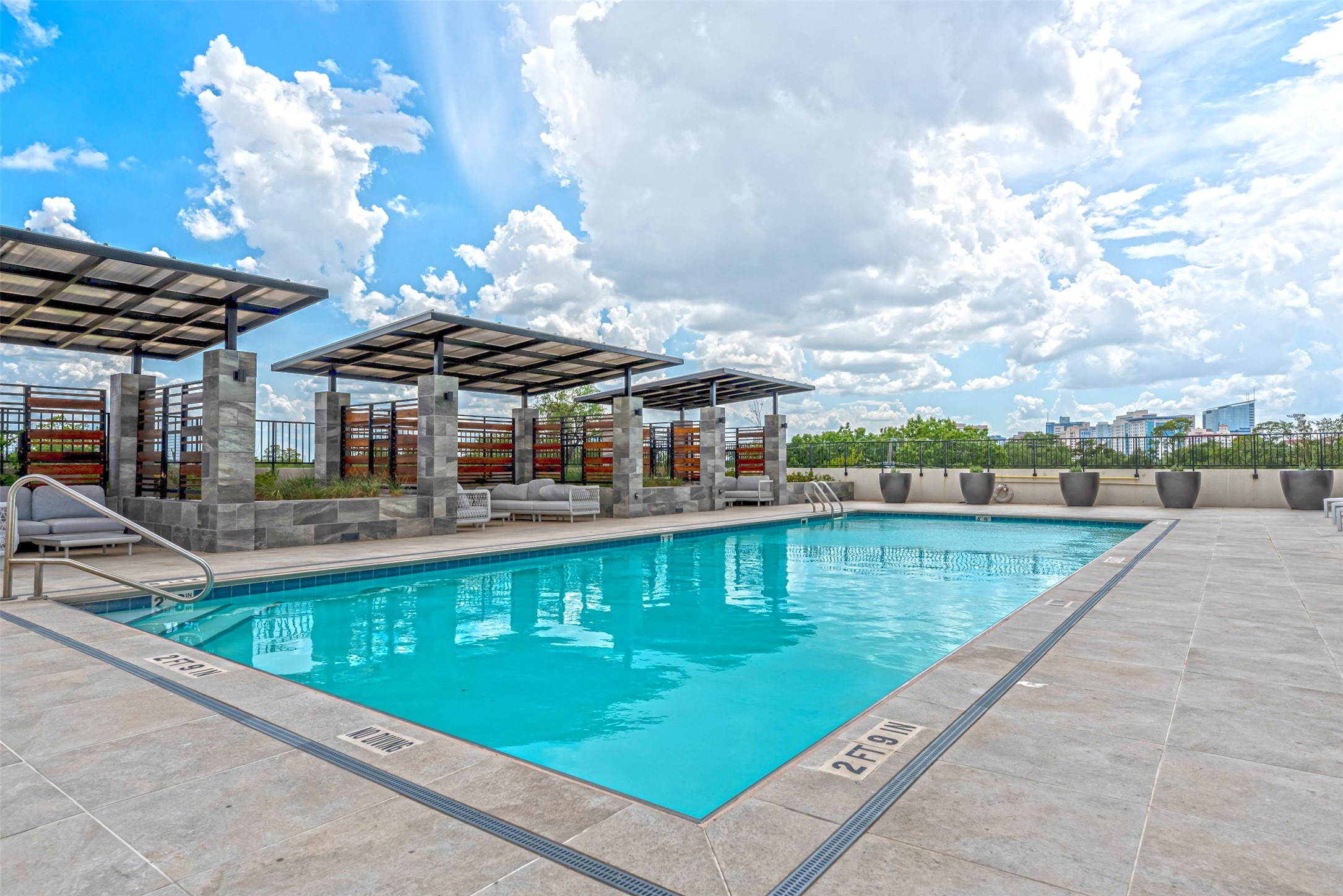 The third floor amenity deck boasts a resort style pool with private cabanas.