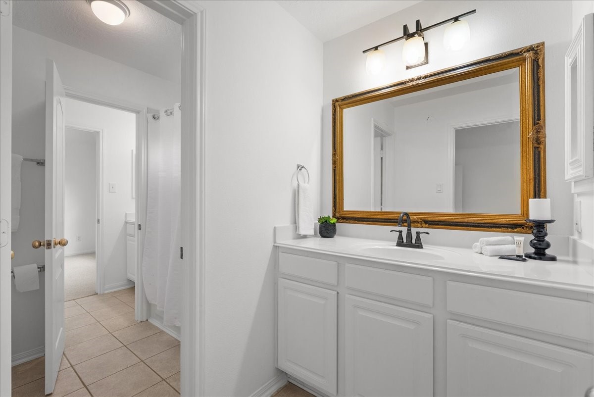 Jack and Jill bathroom with plenty of storage.