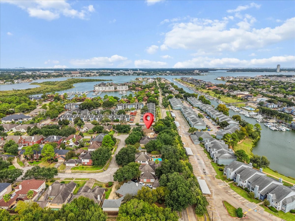Aerial view showing the home just minutes from the marina and open water.