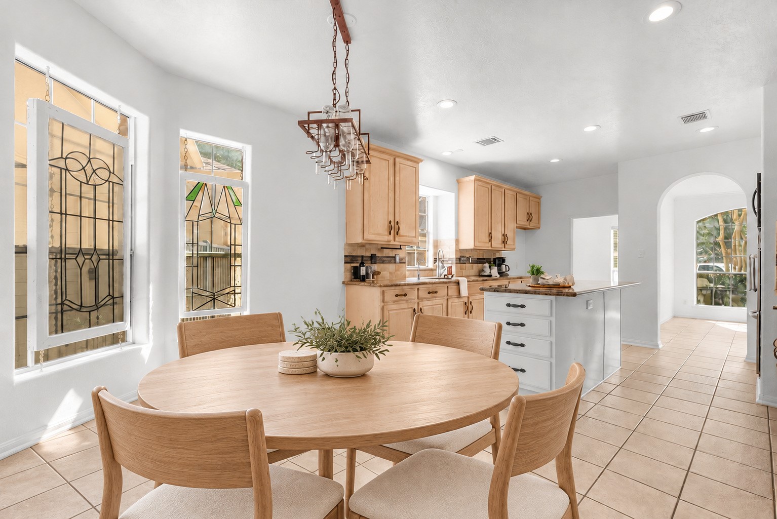 Breakfast area with room for a full table right off the kitchen. Virtually staged.