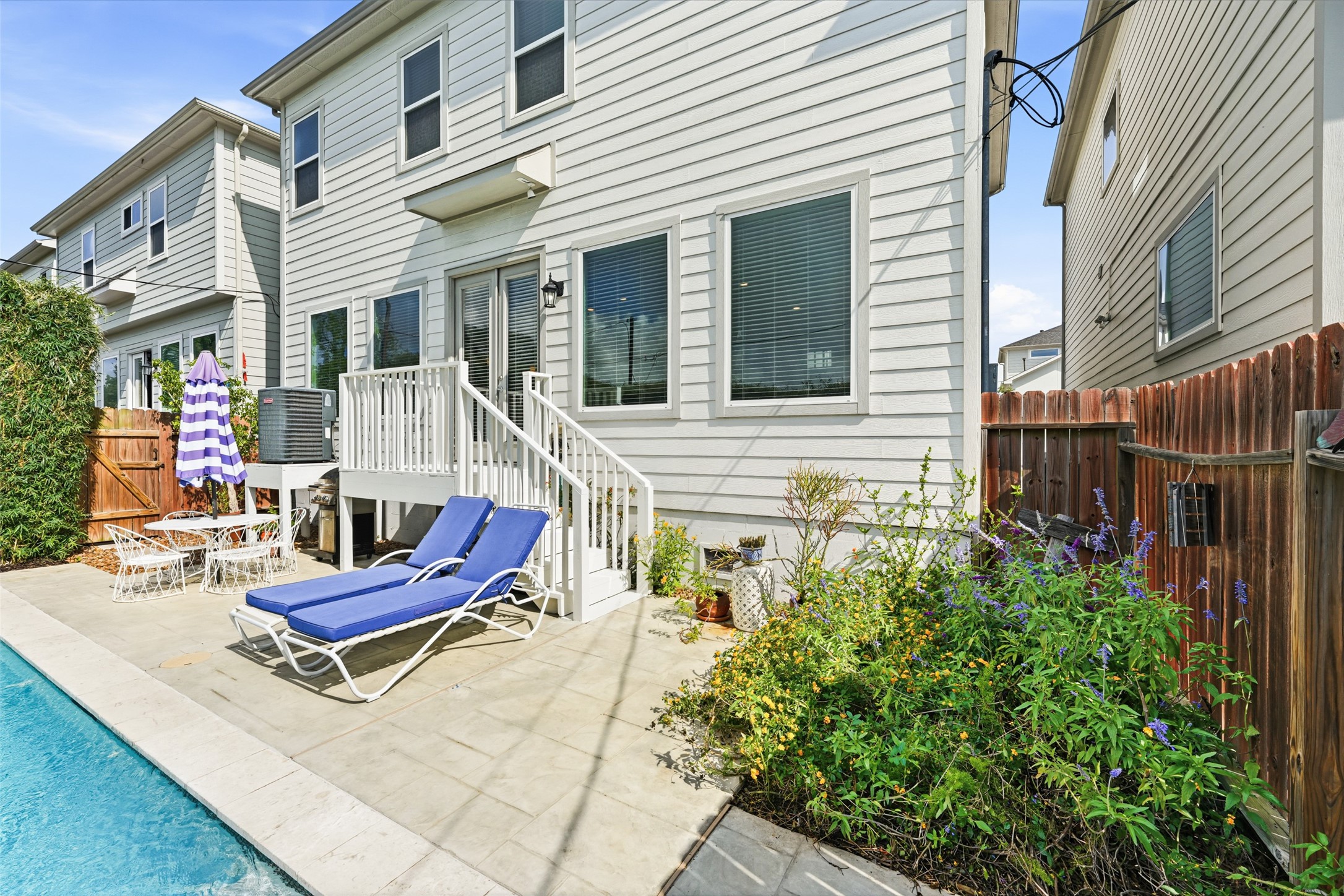 Plenty of room for lounging chairs, table and umbrella. Beautiful established butterfly garden in the corner!