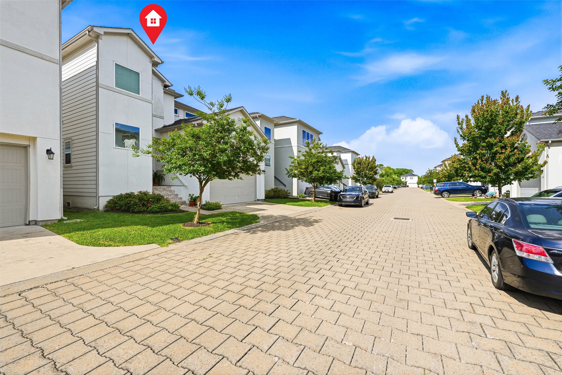 Driveway space, guest parking and wide streets in this gated community.