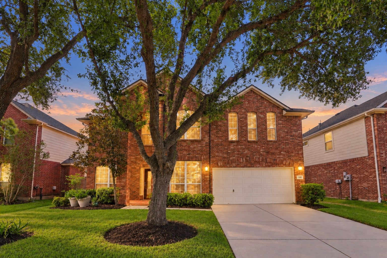 Welcome home to this beautiful two-story brick residence in desirable Shadow Creek Ranch! Mature trees frame the manicured front lawn, while the spacious driveway leads to an oversized 2.5-car garage. A welcoming exterior sets the stage for the impressive living spaces inside.  No flooding during any of the storms!