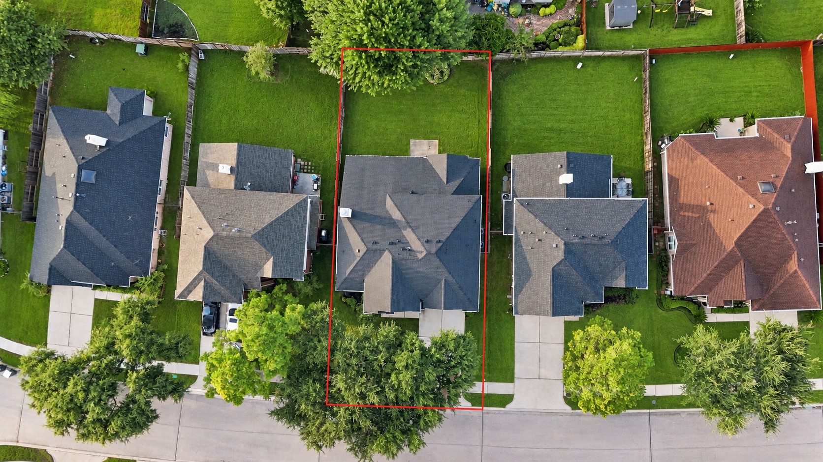 Aerial view showcases the home's desirable location within the established Shadow Creek Ranch neighborhood, highlighting the spacious backyard, neighboring homes, mature trees, and well-maintained residential setting.  Roof about 2 years old!  Amazing location!