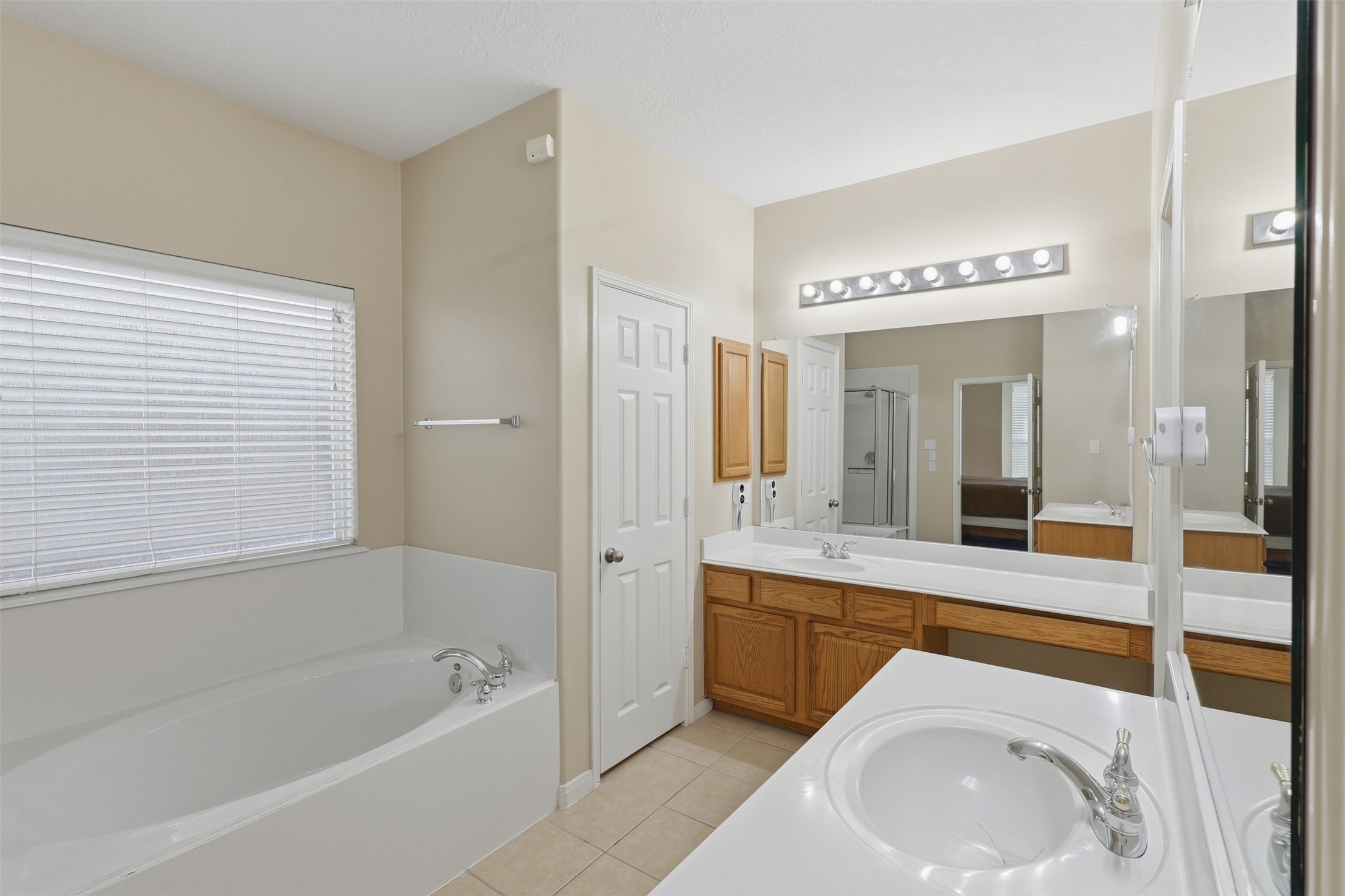 The spacious private vanity provides plenty of room for your morning routine, complete with a medicine cabinet, and you'll love the two private walk-in closets. Have you scheduled your visit yet?