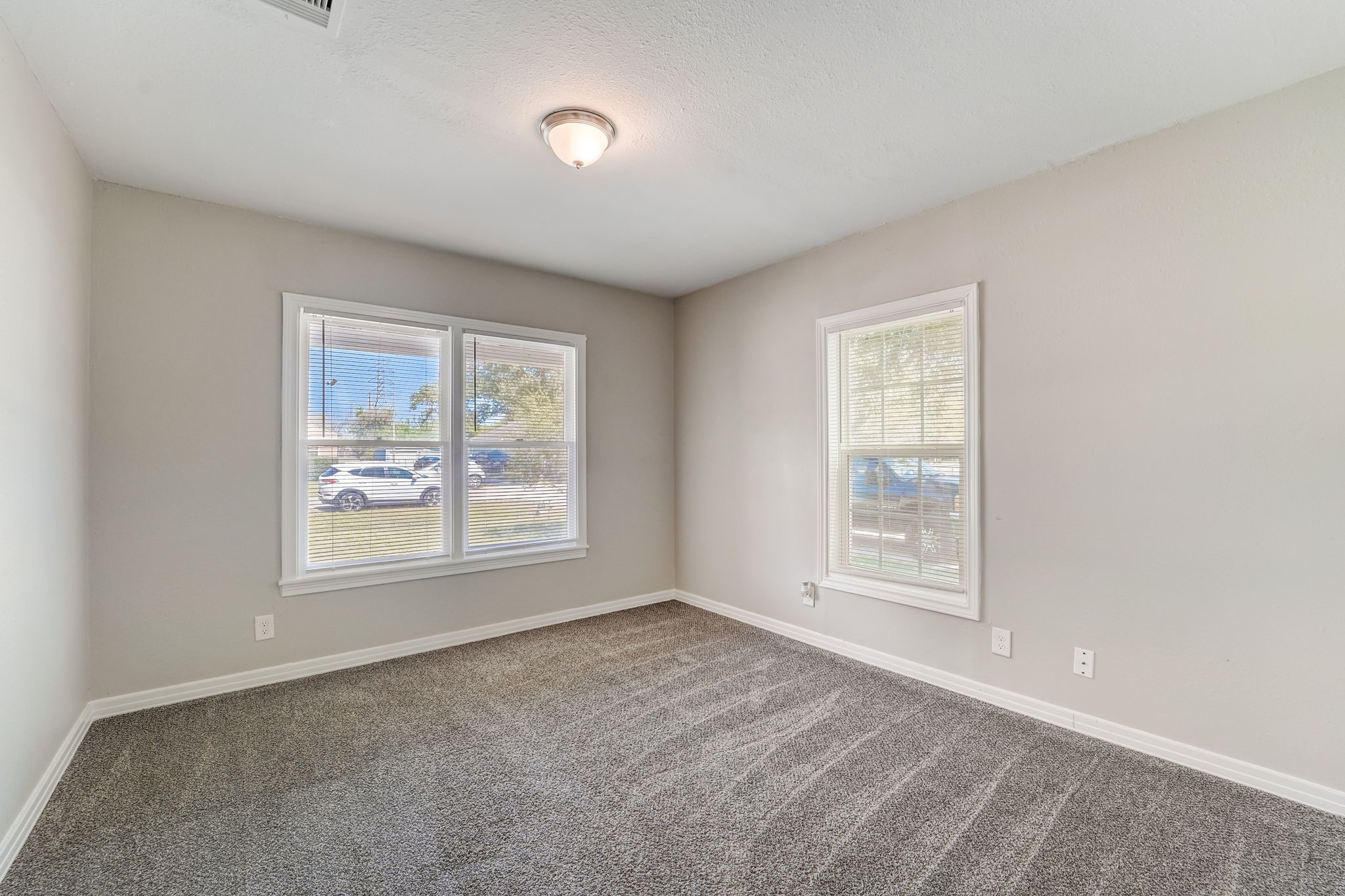 Bedroom one, spacious and lots of natural light.