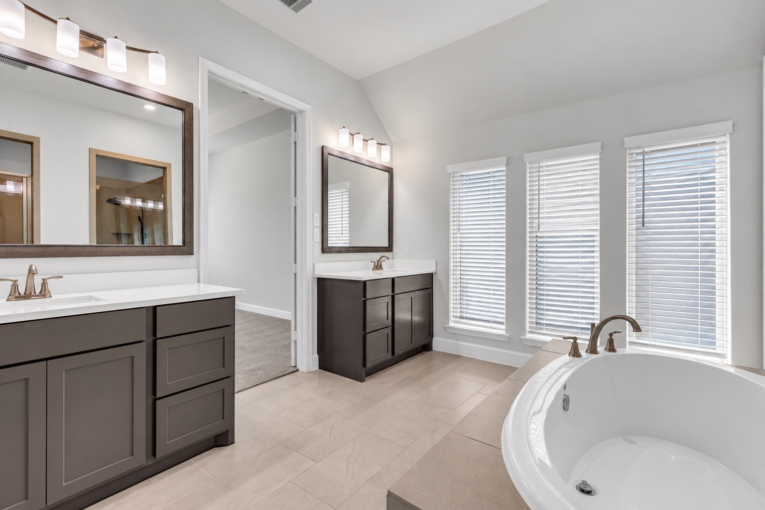 Framed mirrors and seperate sink areas