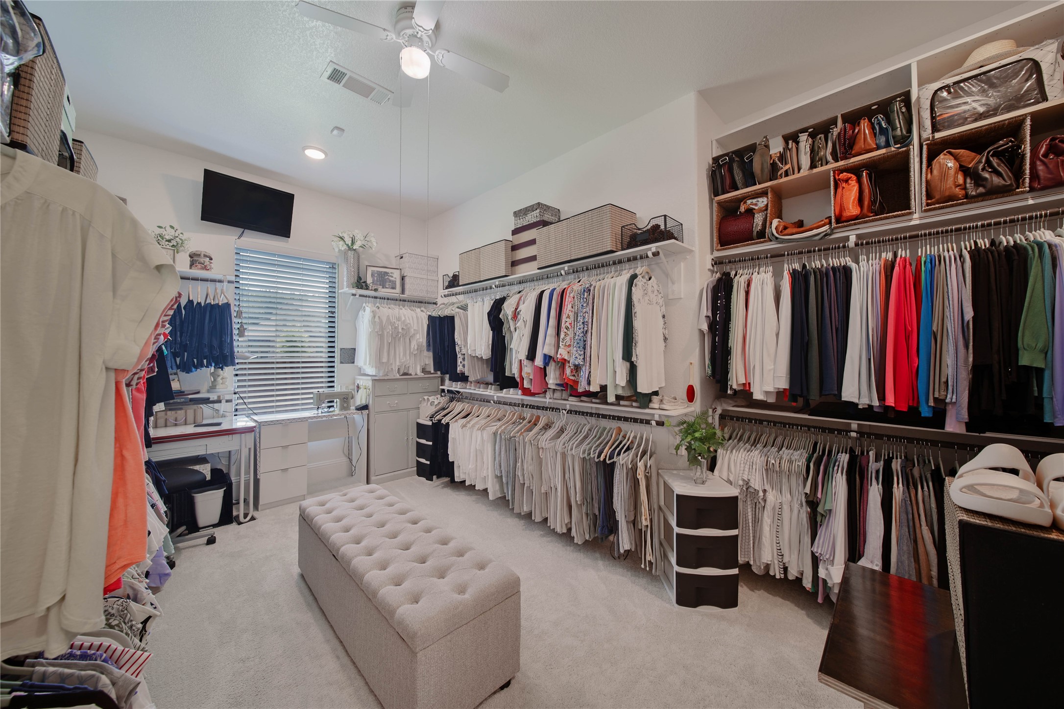 Can you say WOW??!! One of two closets off the primary bath, this spacious closet was enlarged during construction with an additional 6-foot extension, creating even more room for storage.