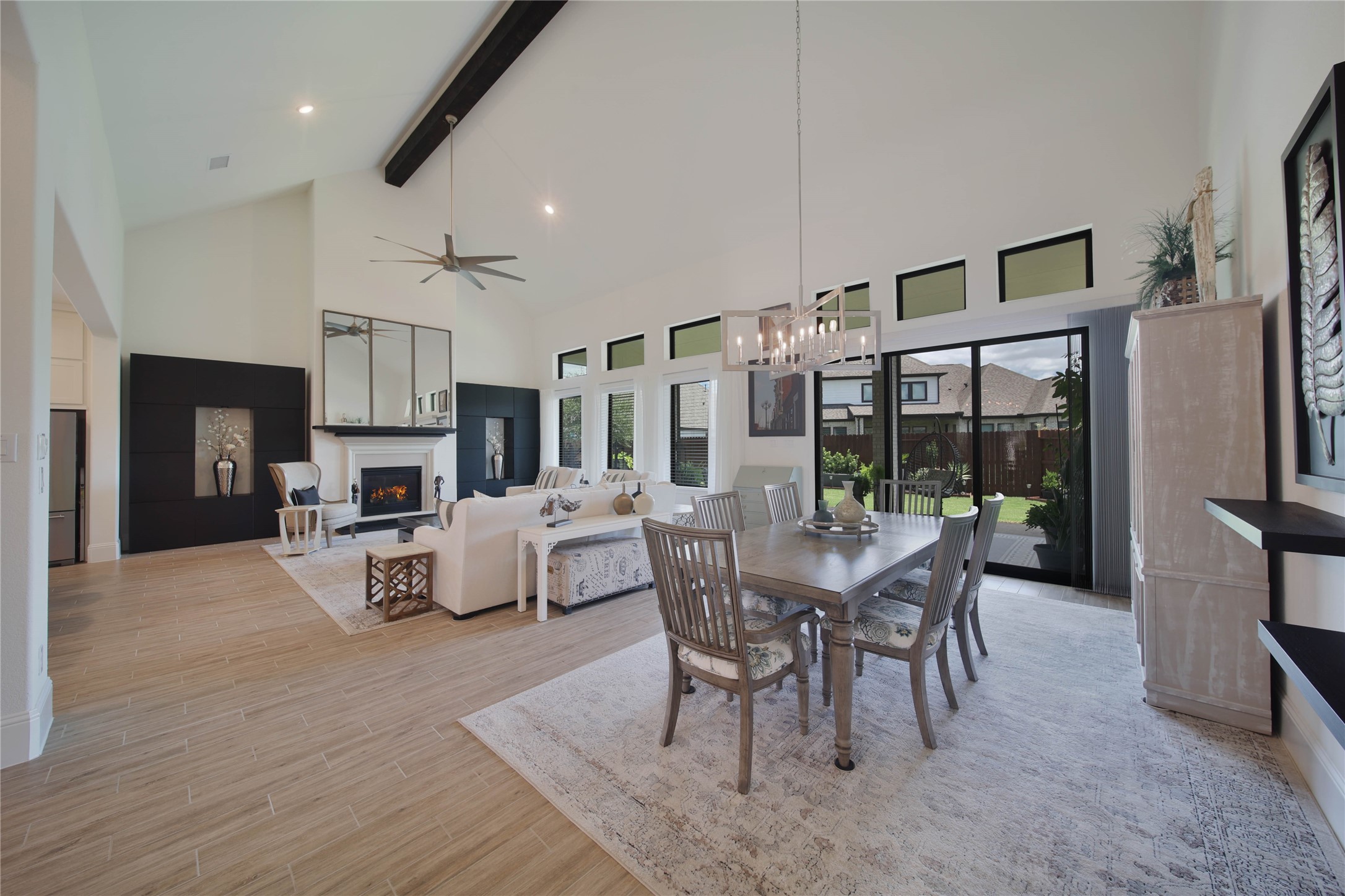 The living, dining, and kitchen areas flow seamlessly together, creating the perfect space for entertaining while keeping everyone connected and engaged.