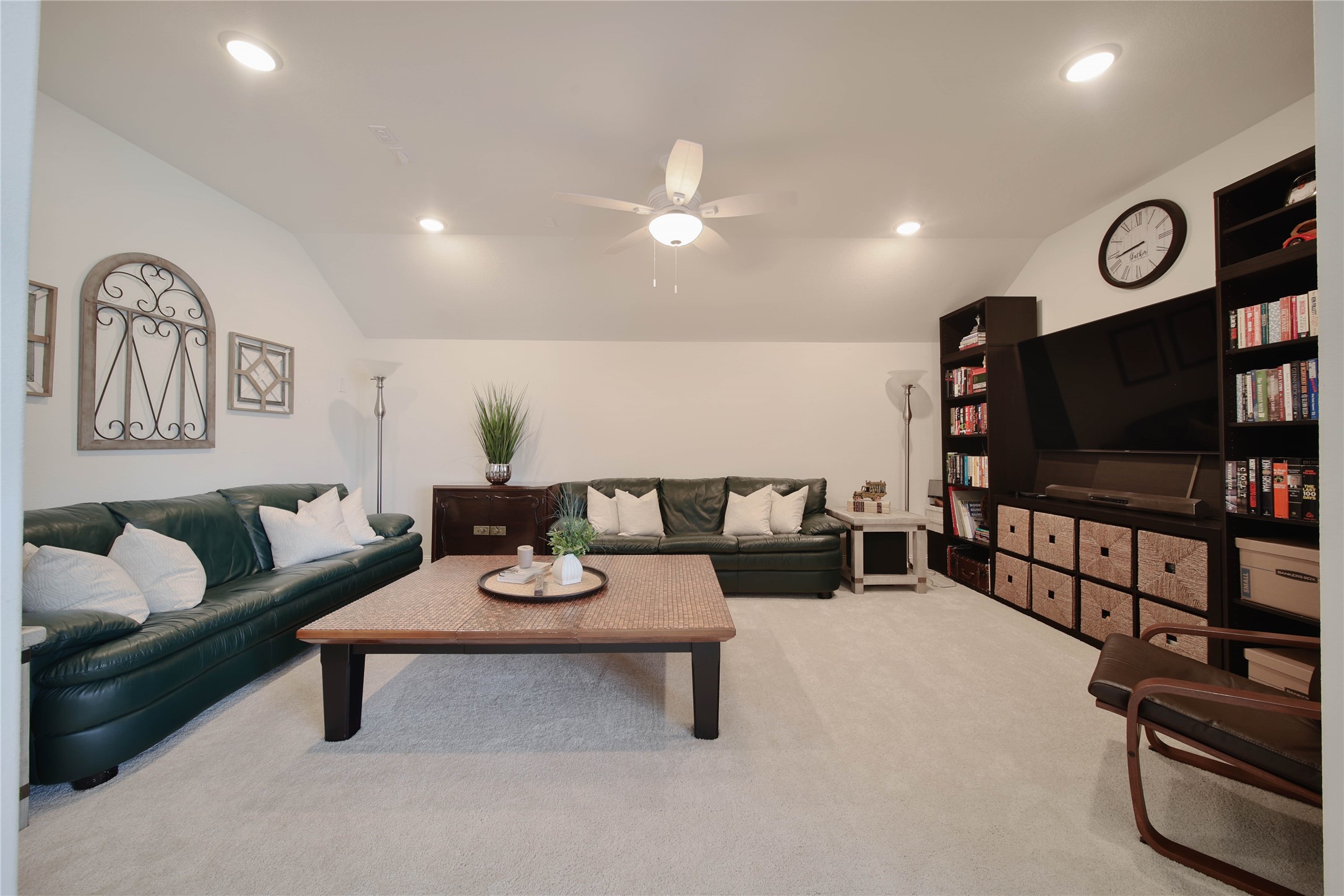 Just off the game room, a dedicated media room is ready for movie nights, game days, and endless entertainment. The room is wired for 6.0 surround sound.