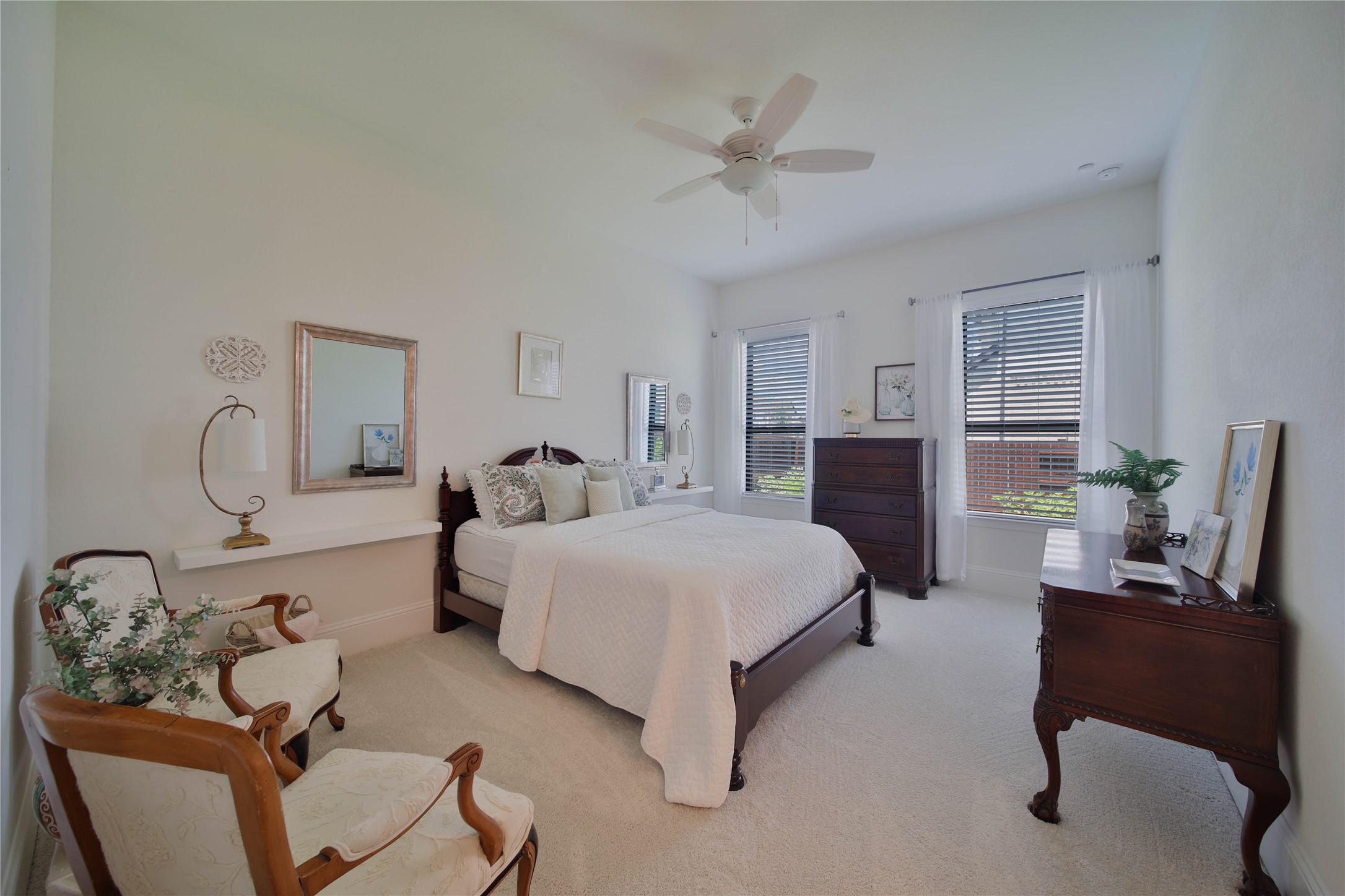 The highly sought-after second bedroom downstairs is tucked away in its own private wing, making it ideal for a nursery, weekend guests, or multigenerational living.