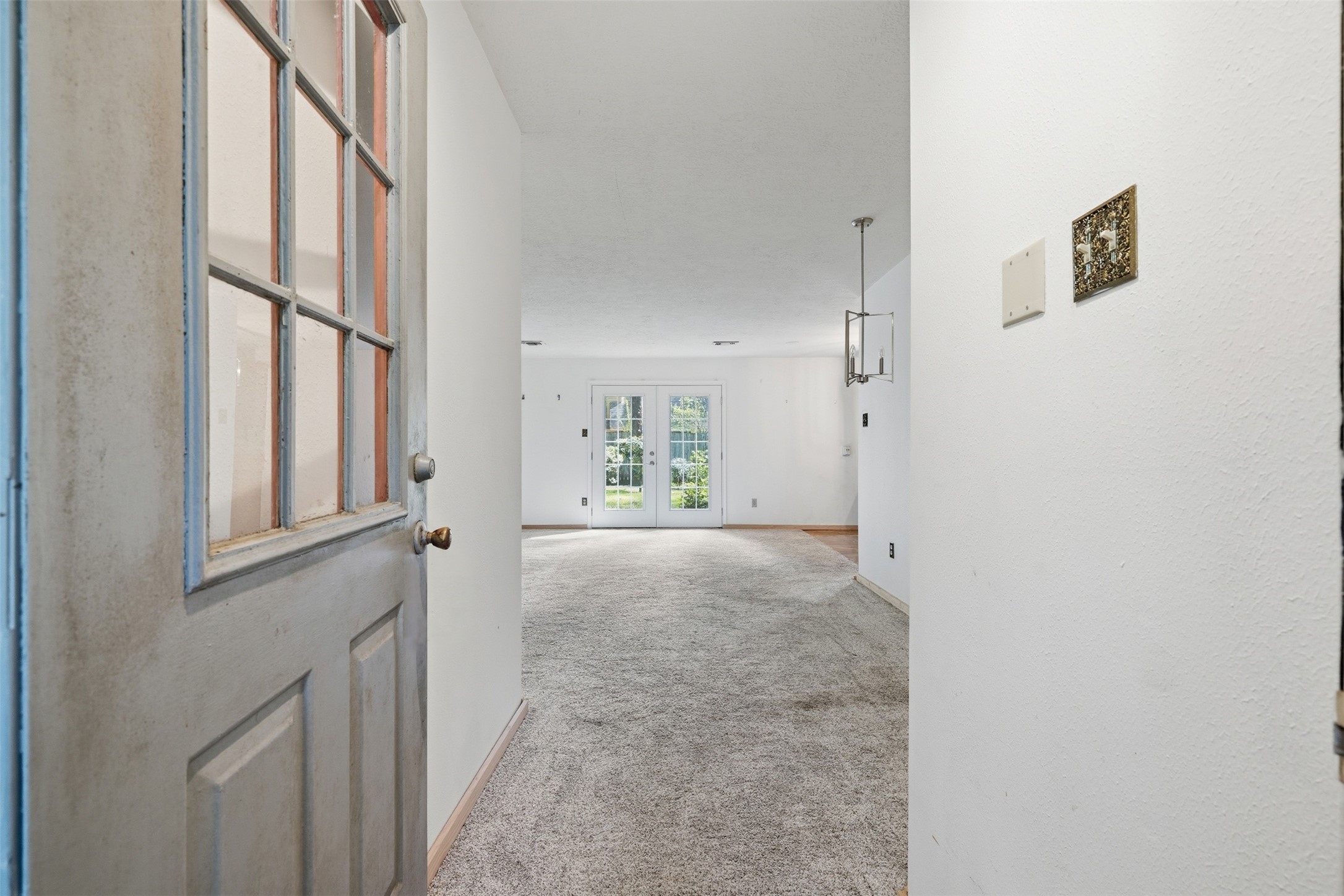 Entrance into large living room Entrance into large living room
