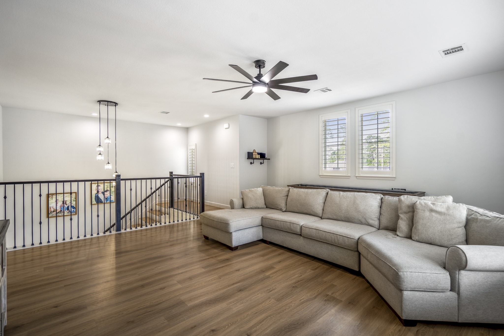 Same flex space but different view, highlighting the upgraded railing for an added touch.