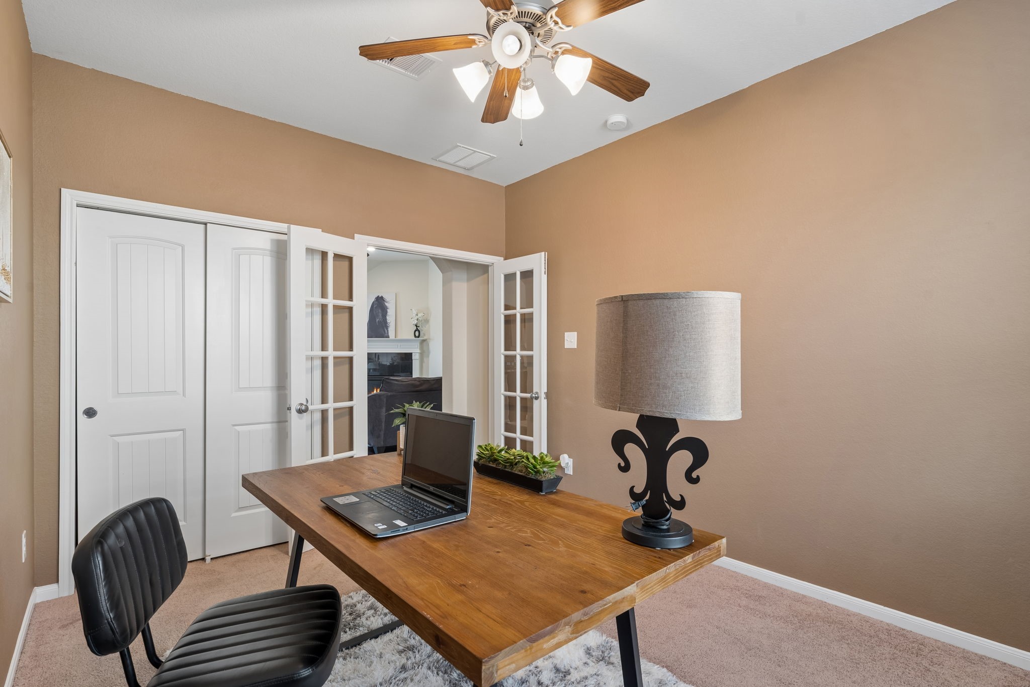 This room can be used as either an office or extra bedroom with a closet.