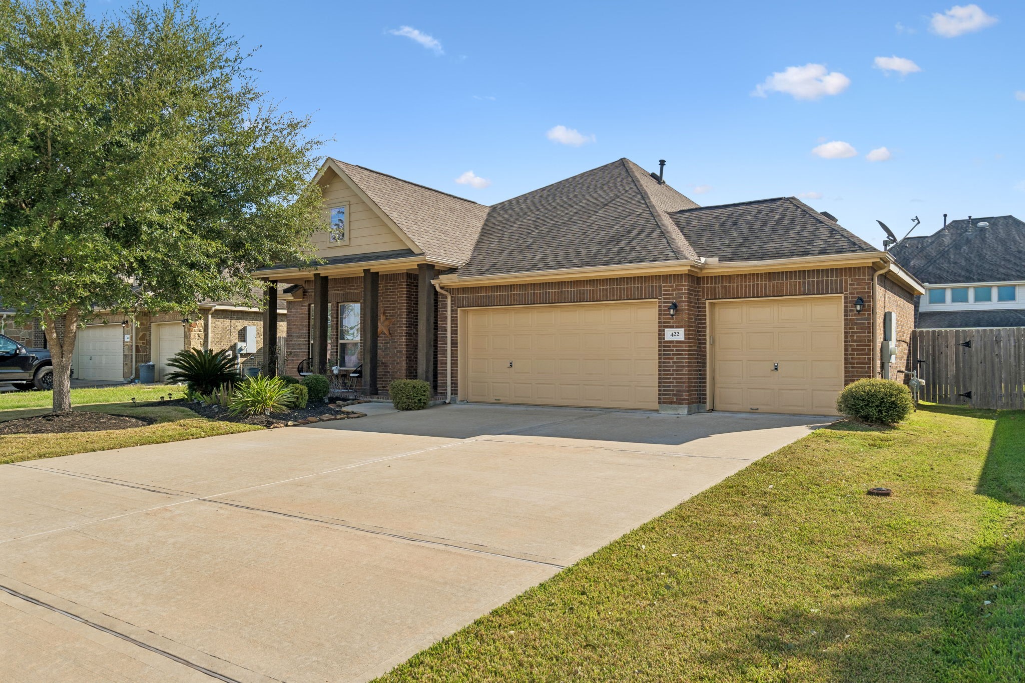 Space for everyday life! This League City property features a three-car garage and an expansive driveway