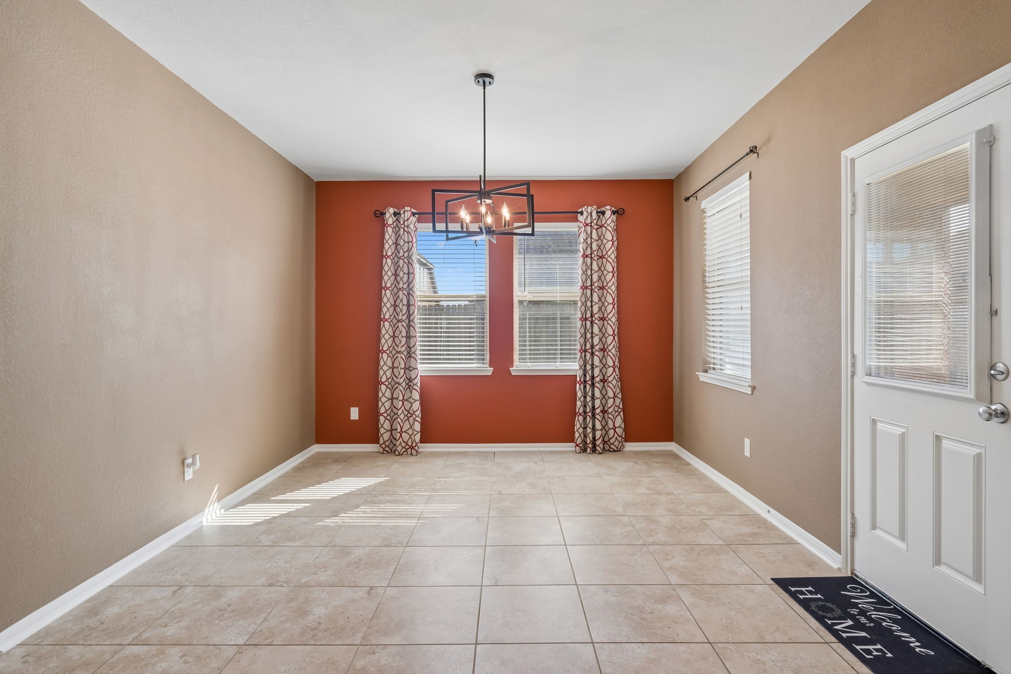 Natural light fills this spacious breakfast area located just off the kitchen