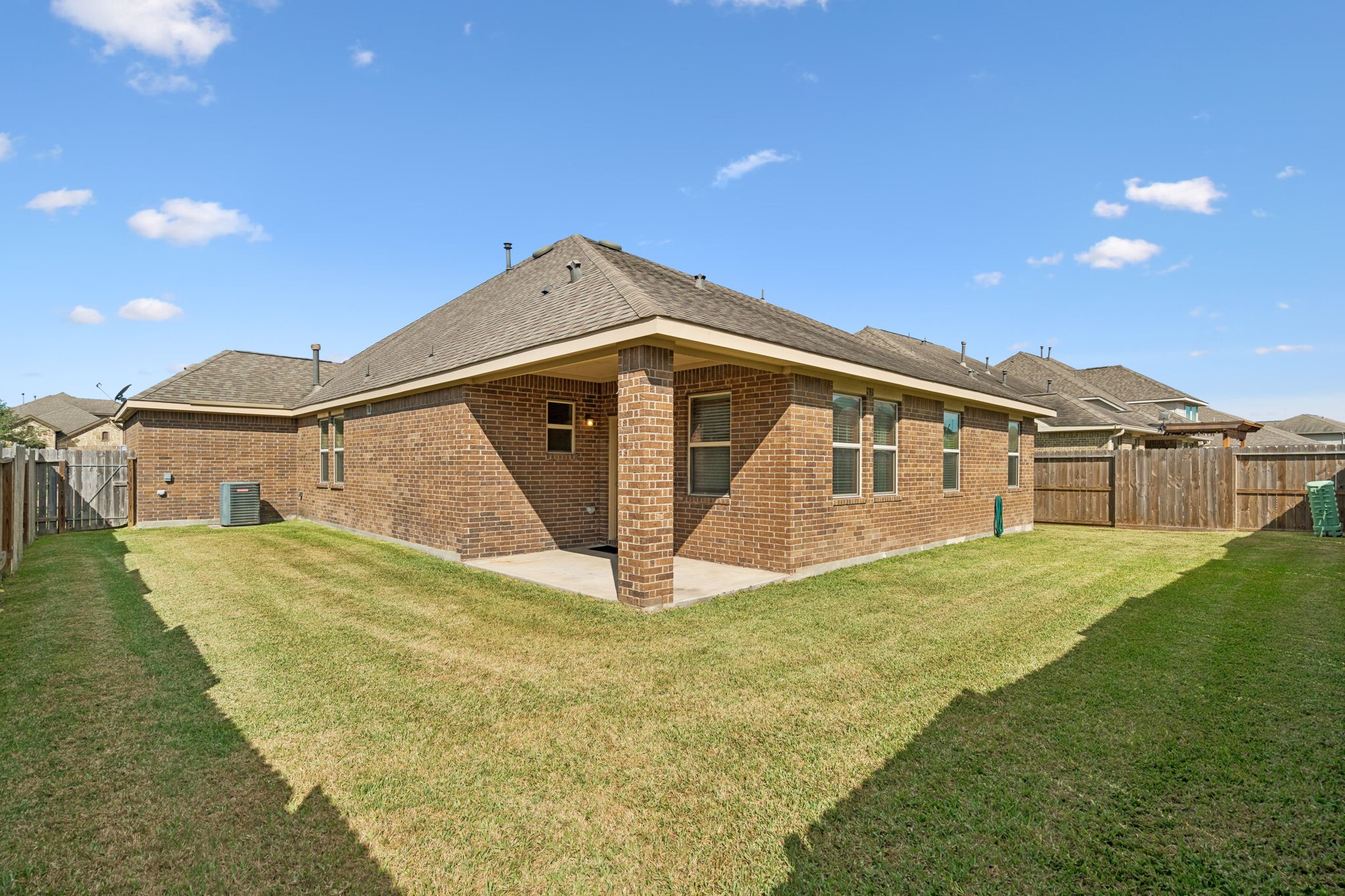 Plenty of open green space offers flexibility for outdoor entertaining, gardening or creating your own backyard retreat
