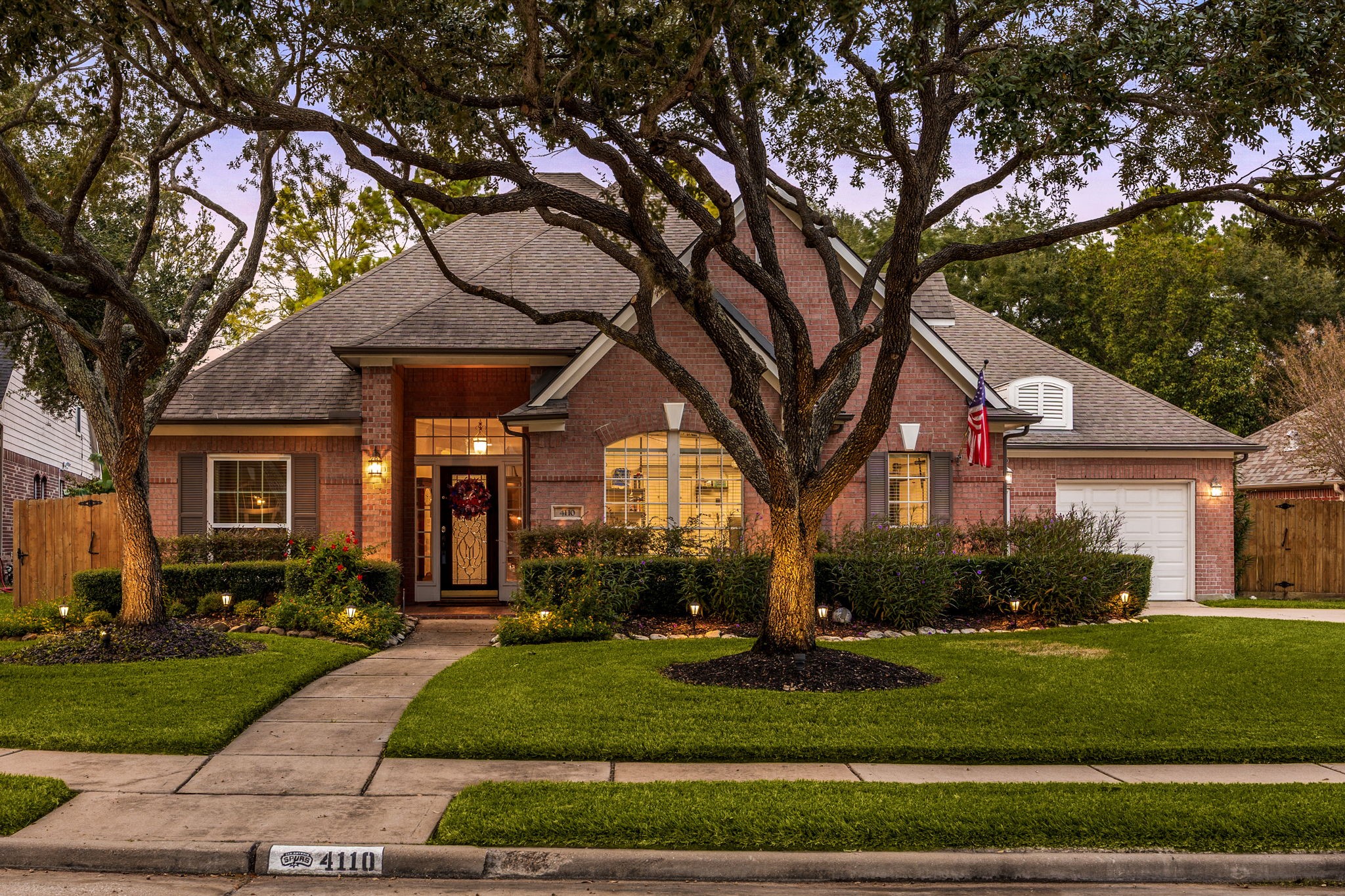 Welcome home to 4110 Garden Cove Court located on a quiet cul-de-sac street in Cinco Ranch and zoned to Katy ISD! This stunning home has lovely curb appeal, a well-manicured lawn, beautiful landscaping, brick elevation, dark stained front door with glass detailing, covered front porch, traditional style, dark stained shutters, beautiful outdoor lanterns and a double wide driveway! Welcome home to 4110 Garden Cove Court located on a quiet cul-de-sac street in Cinco Ranch and zoned to Katy ISD! This stunning home has lovely curb appeal, a well-manicured lawn, beautiful landscaping, brick elevation, dark stained front door with glass detailing, covered front porch, traditional style, dark stained shutters, beautiful outdoor lanterns and a double wide driveway!
