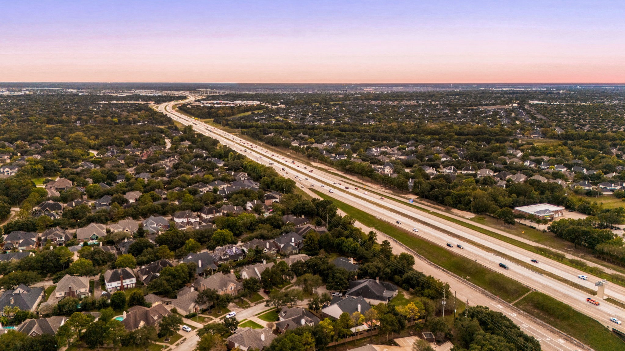 This aerial drone shot showcases the incredibly convenient, close proximity to major thoroughfares, including the Westpark Tollway and Grand Parkway (99). Enjoy a fast, effortless commute and seamless access to premier dining, shopping, and entertainment hubs while living tucked away in a quiet neighborhood.
