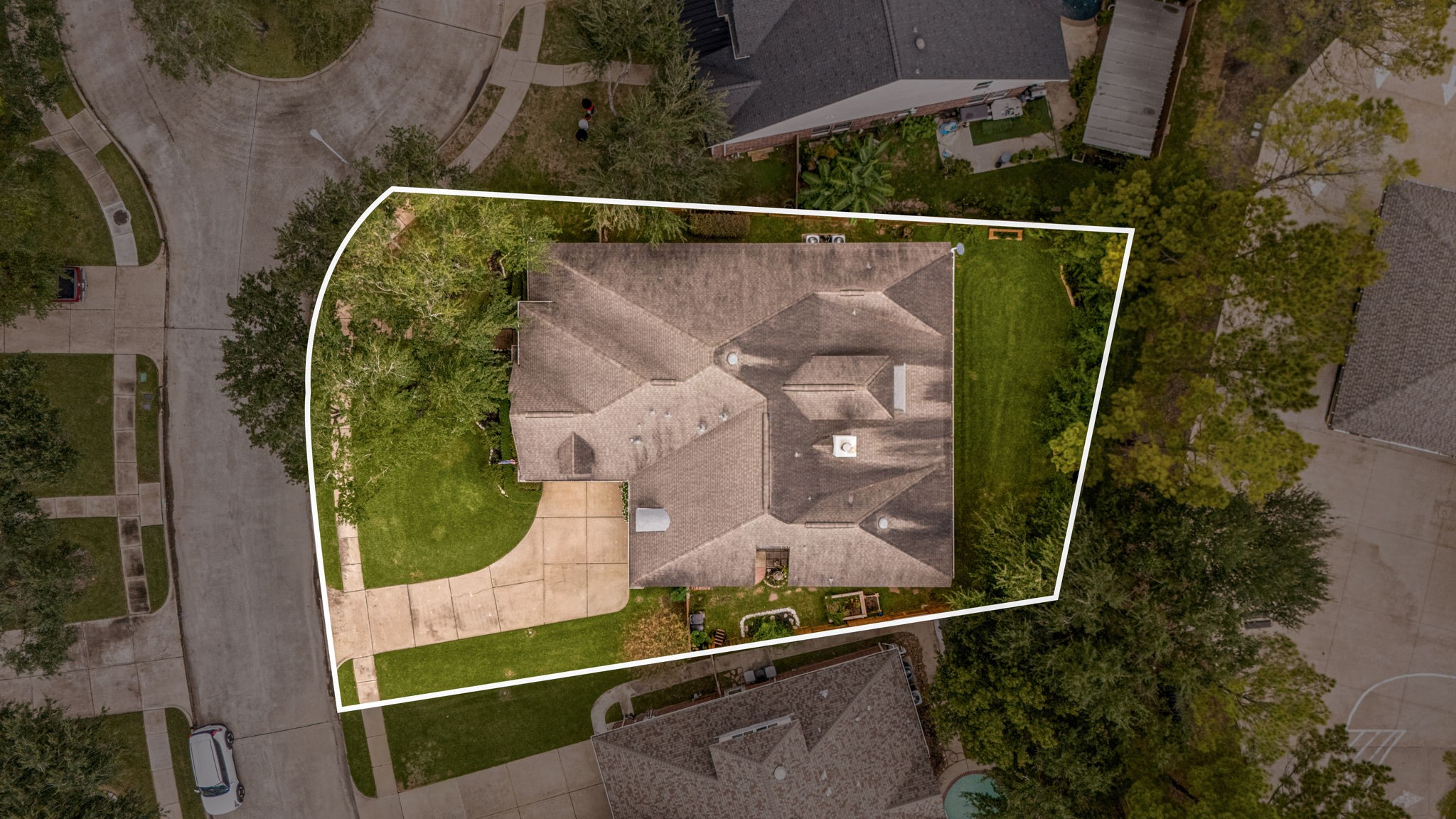 This premium homesite highlights a sprawling backyard, a massive wrap-around driveway leading to the 3-car garage, and exceptional privacy with no immediate rear neighbors. The perfect visual to showcase the scale and prime location of this Cinco Ranch property! This premium homesite highlights a sprawling backyard, a massive wrap-around driveway leading to the 3-car garage, and exceptional privacy with no immediate rear neighbors. The perfect visual to showcase the scale and prime location of this Cinco Ranch property!