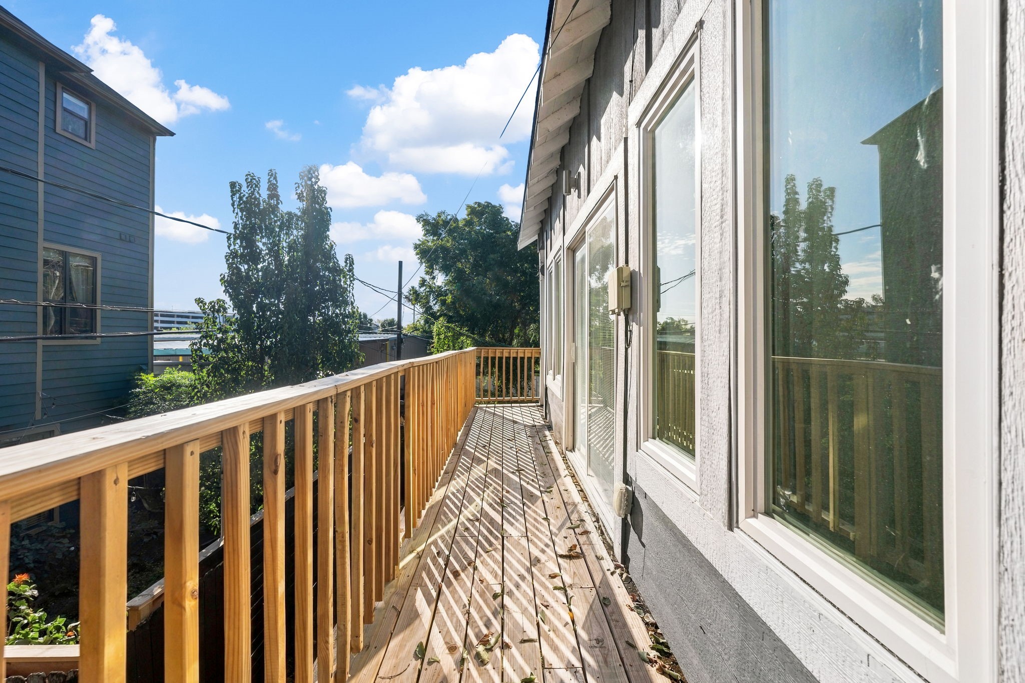 The deck looks out over the back yard.