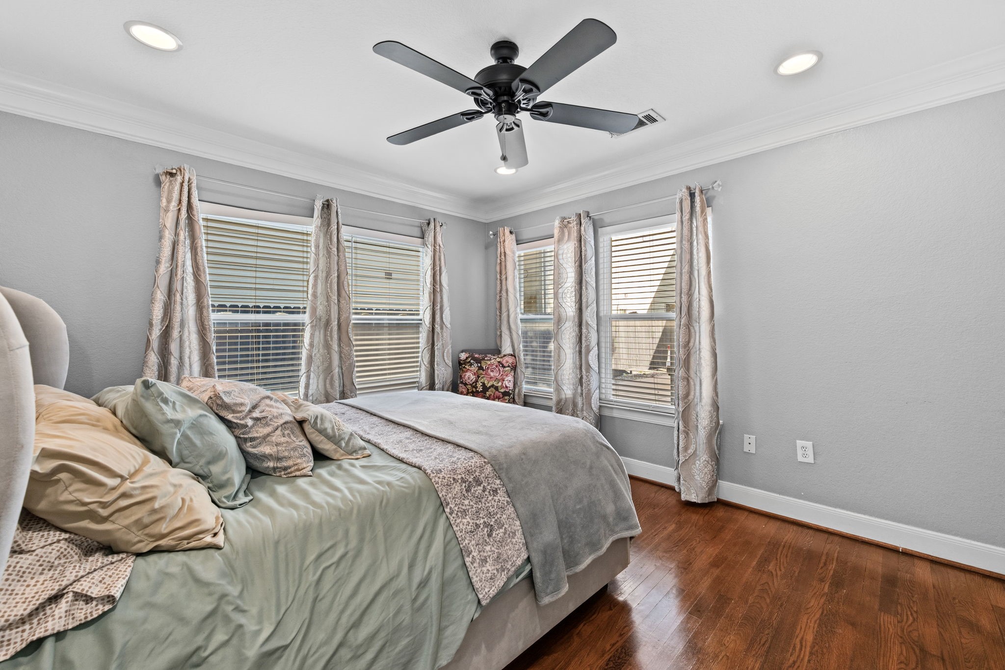 Another bedroom with hardwood floors and good light.