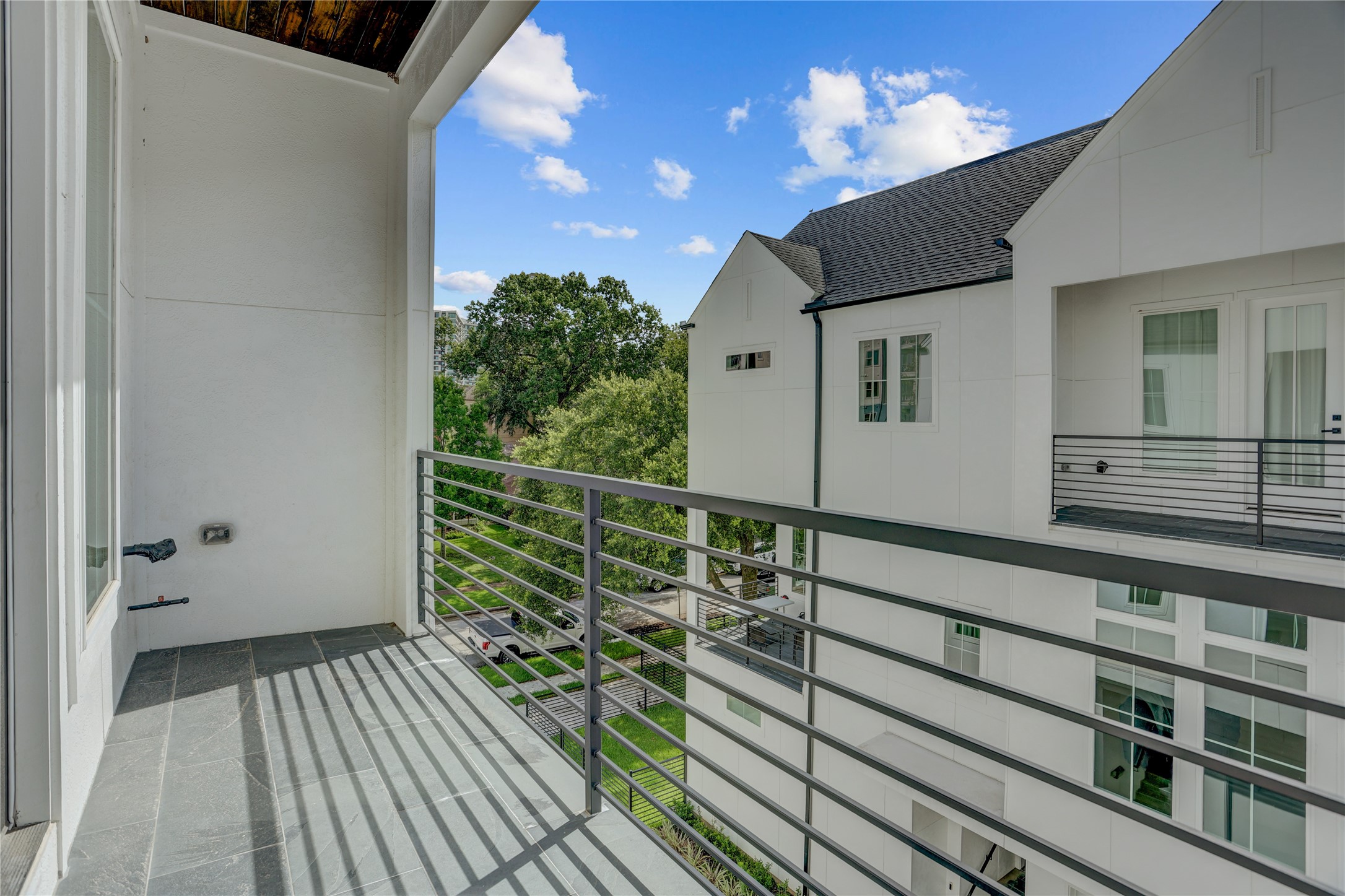 The primary suite offers a private balcony overlooking the community. The primary suite offers a private balcony overlooking the community.