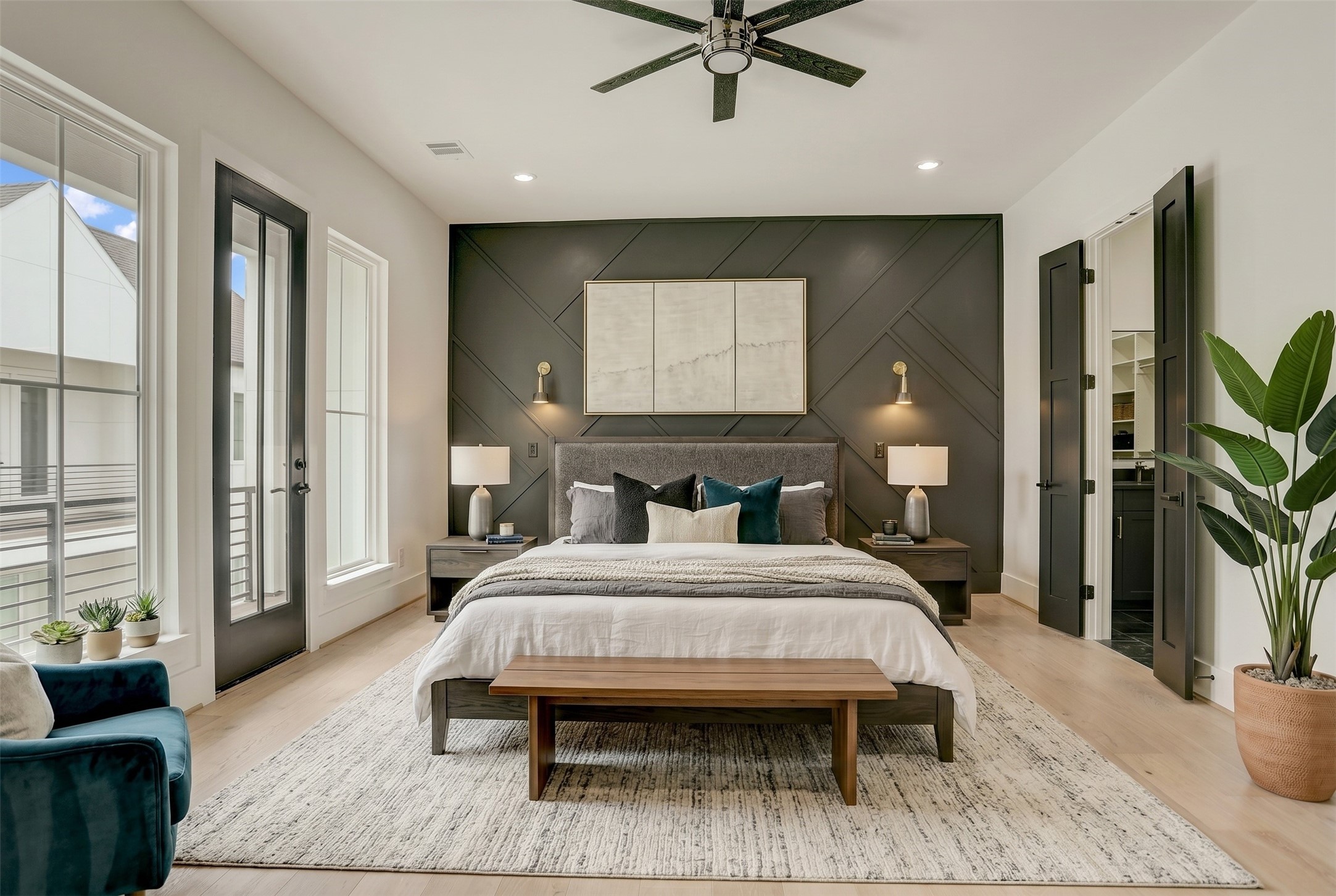 The primary suite sits on the third floor and offers a spa-like retreat. Virtually staged photo. The primary suite sits on the third floor and offers a spa-like retreat. Virtually staged photo.