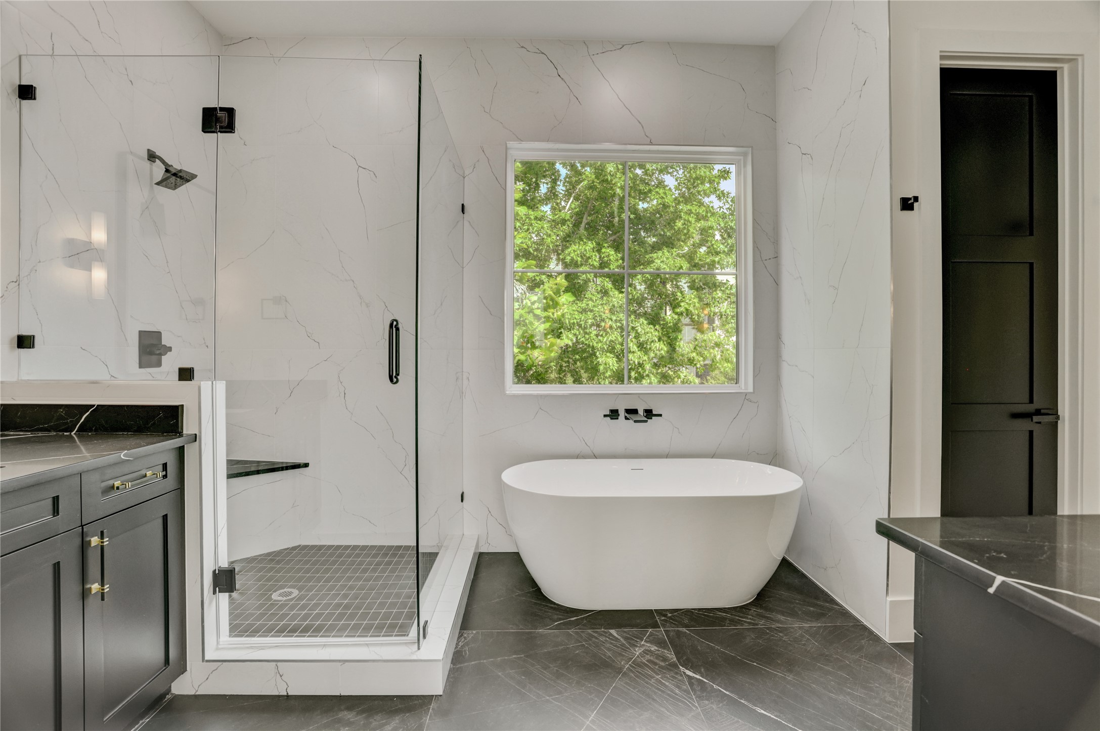 A close up of the primary bathroom wet areas.