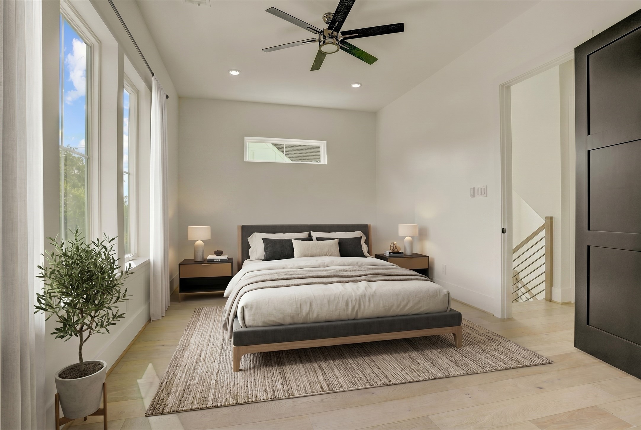 An additional third-floor suite is located opposite the primary space. Virtually staged photo.