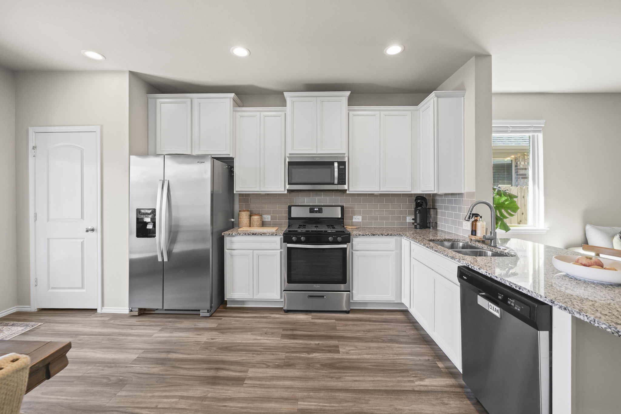KitchenThe heart of the home, this inviting kitchen offers a spacious island, ample cabinetry, and plenty of room to cook, gather, and entertain.