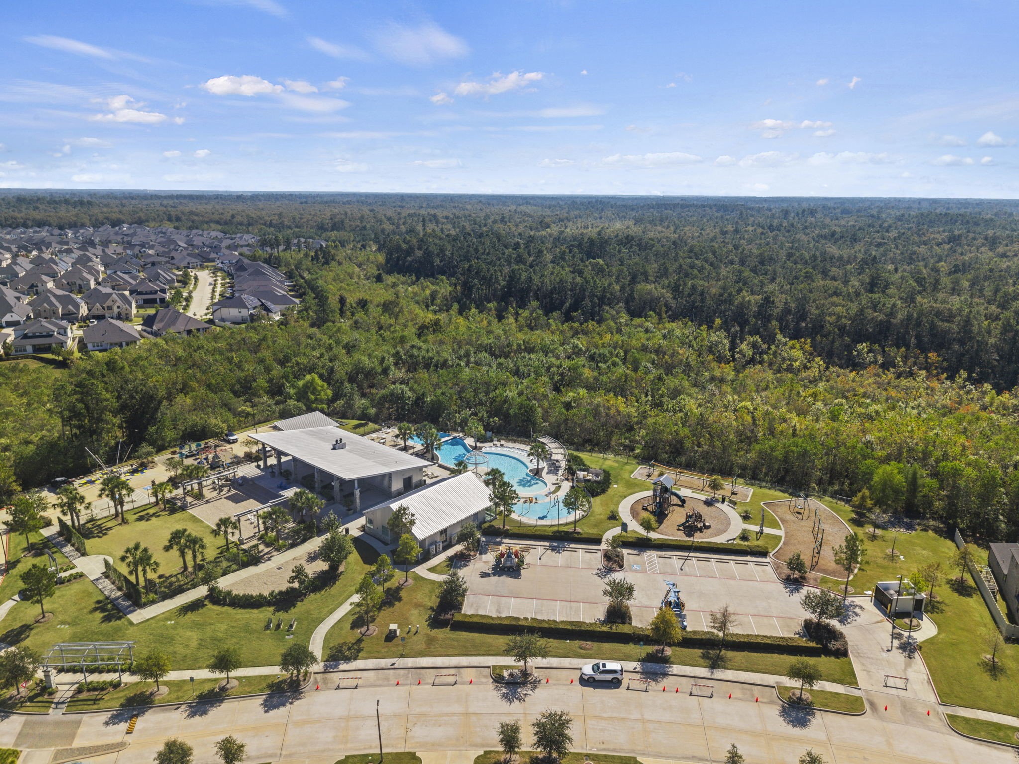 Enjoy resort-style living with a community pool, splash pad, clubhouse, and scenic walking trails, all designed for relaxation and outdoor fun.