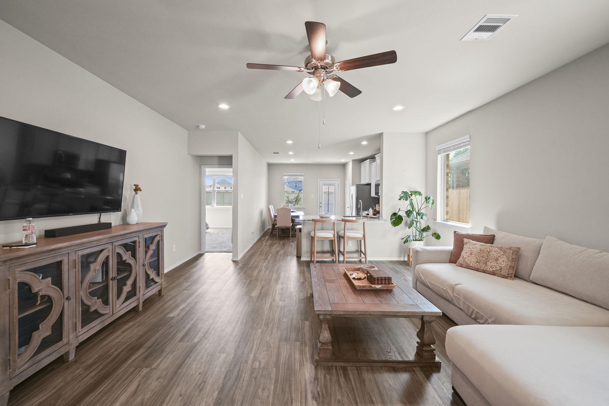 Thoughtfully designed living room with an airy, open feel, beautiful natural light, and plenty of room to unwind or gather with family and friends.