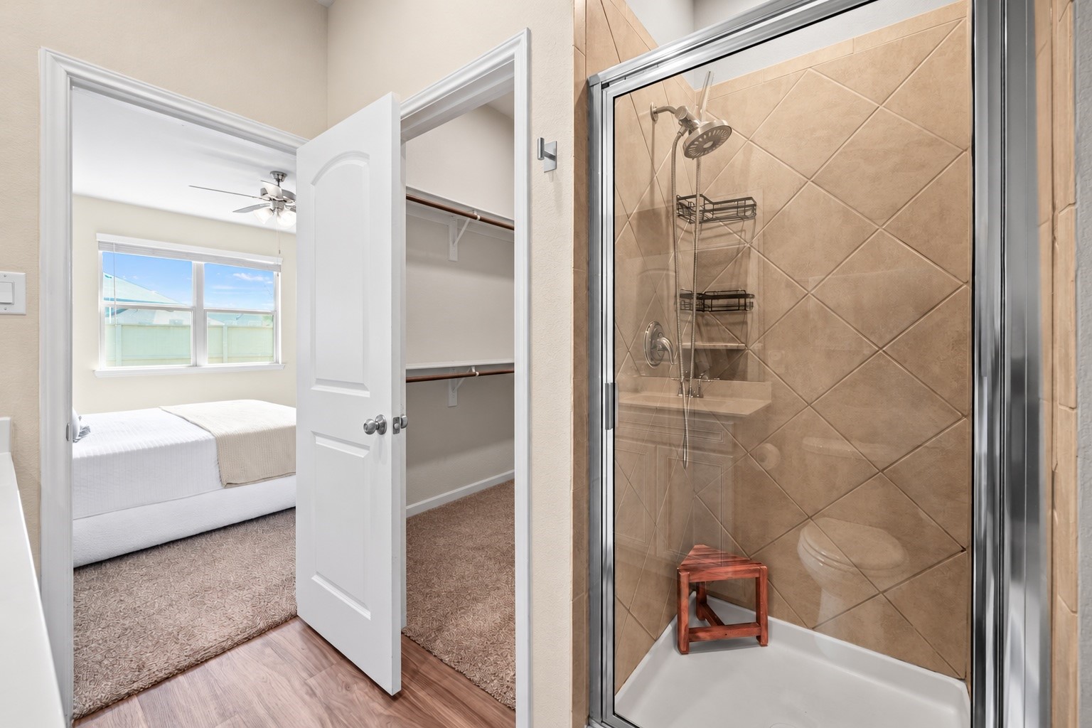 A private primary bath designed for everyday ease, offering a refreshing space to start your morning or wind down after a long day.

Virtually Enhanced