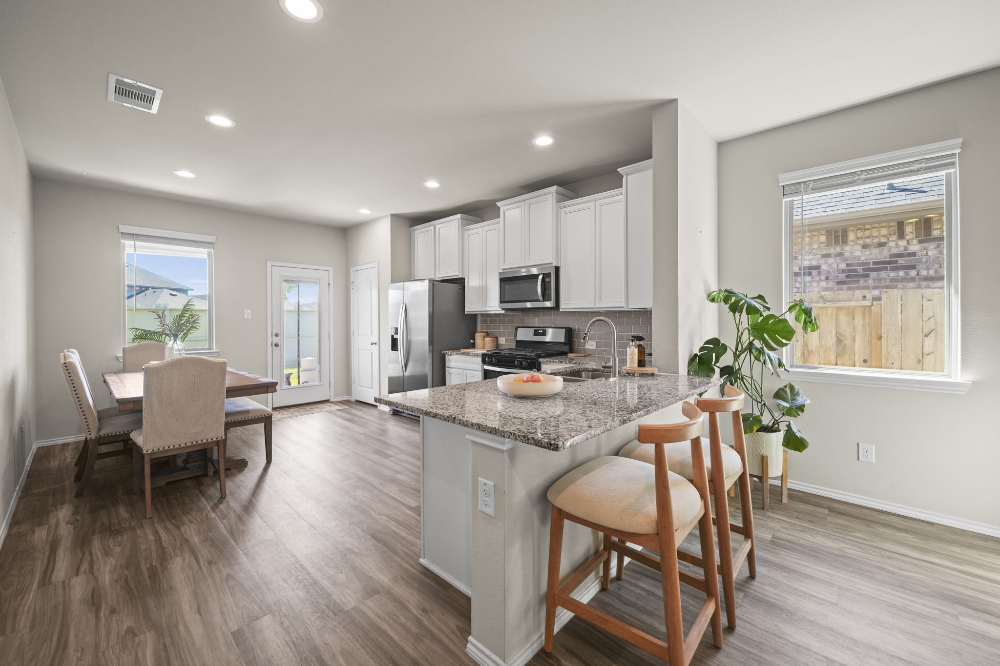 Beautiful kitchen with generous counter space, a spacious island, and an open layout that makes cooking and entertaining effortless.