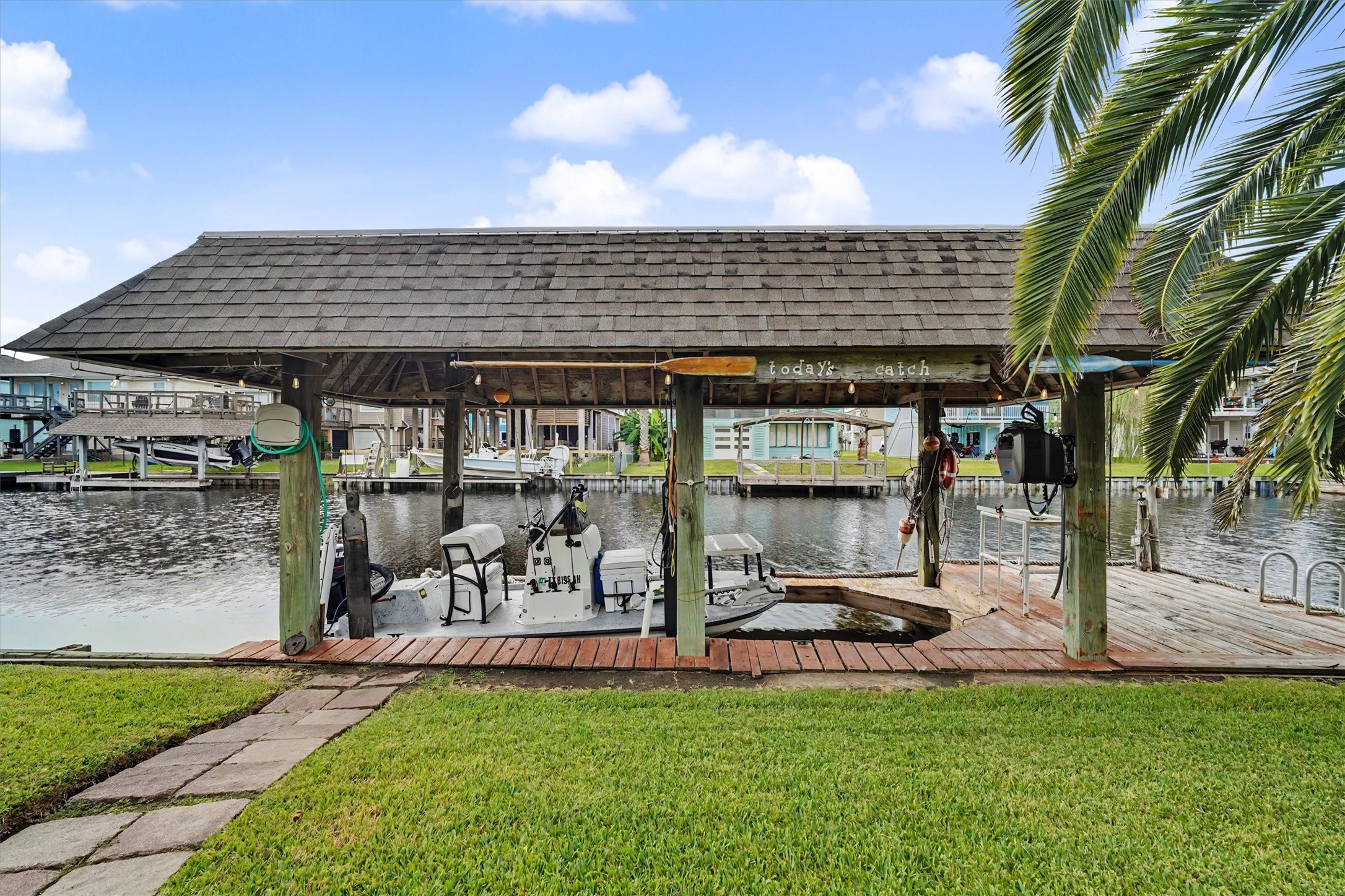 Skip the monthly expense of off-site boat storage and keep your boat right at home and ready for your next adventure! With a private boathouse and boat lift, you're just steps away from launching into the water Skip the monthly expense of off-site boat storage and keep your boat right at home and ready for your next adventure! With a private boathouse and boat lift, you're just steps away from launching into the water