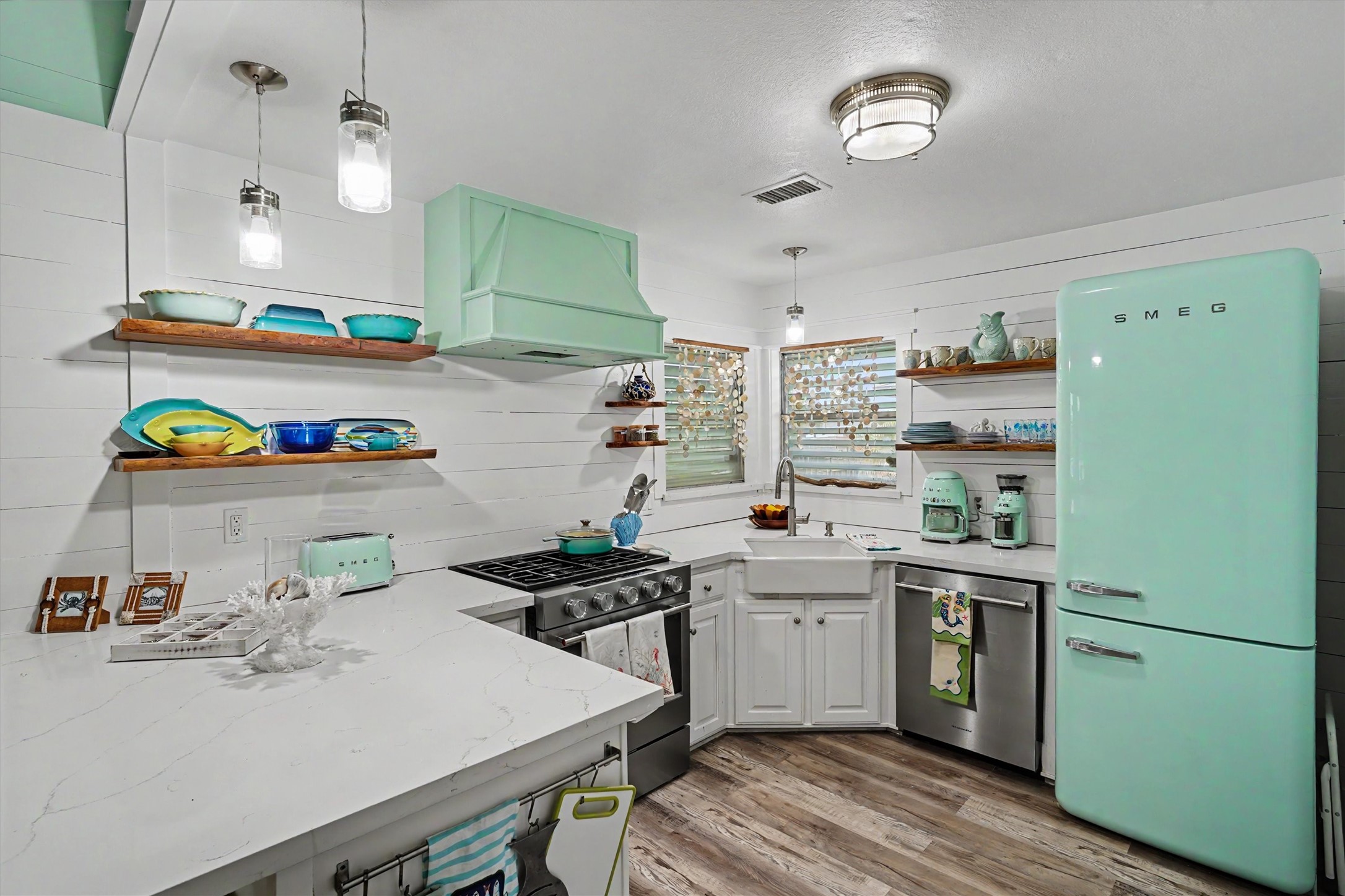 From the quartz countertops to the high-end appliances, every detail of this kitchen was thoughtfully updated to create a space that's as beautiful as it is functional From the quartz countertops to the high-end appliances, every detail of this kitchen was thoughtfully updated to create a space that's as beautiful as it is functional