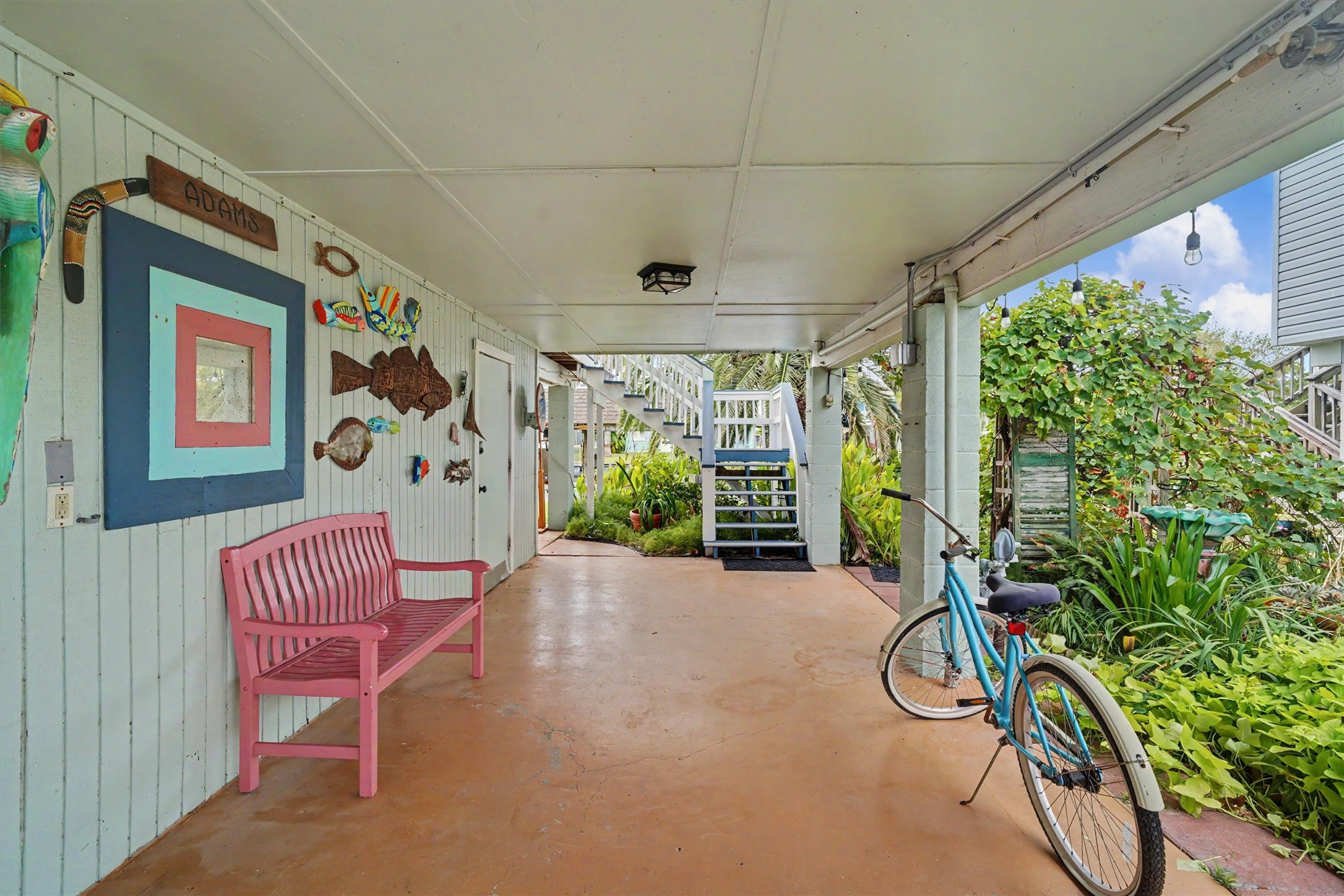 An expansive downstairs open-bay area with room to relax, gather, entertain, and enjoy the waterfront lifestyle An expansive downstairs open-bay area with room to relax, gather, entertain, and enjoy the waterfront lifestyle
