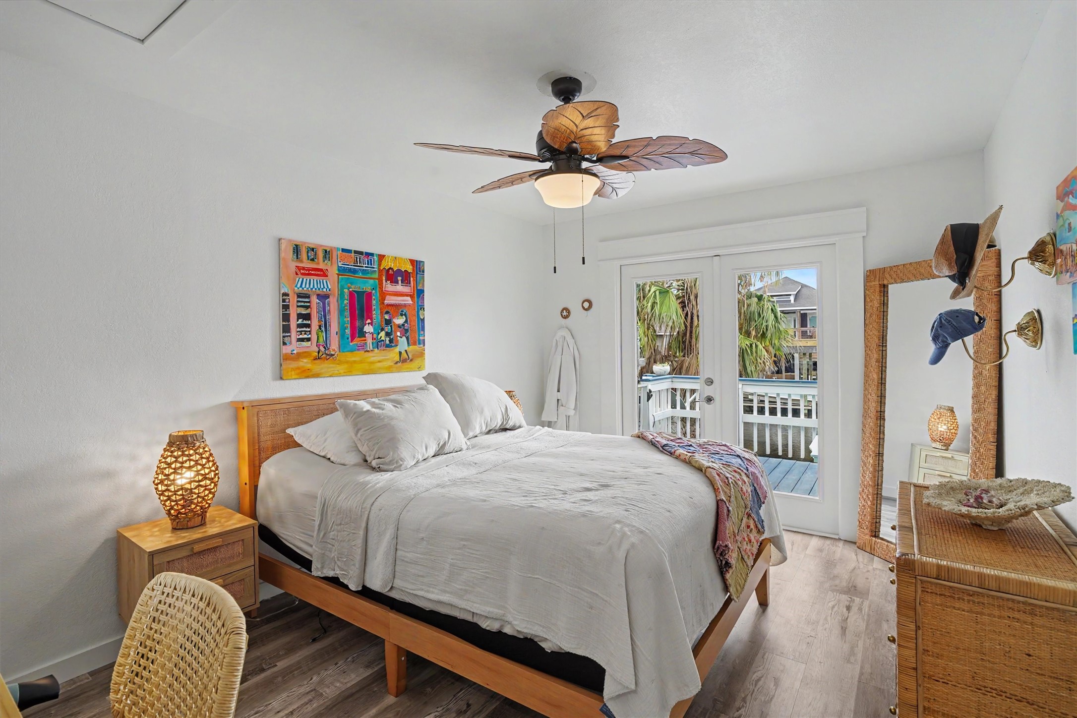 Wake up to the water in your primary bedroom and step through the recently installed French doors onto your covered porchthis is waterfront living at its best!