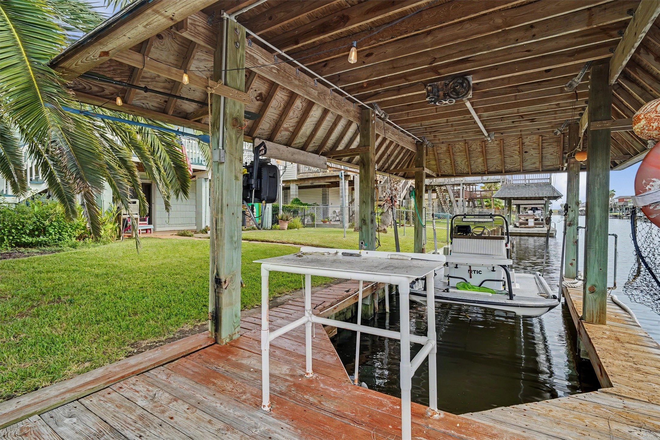 Enjoy the convenience of a private boat slip right at your waterfront home, giving you easy access to your boat whenever the mood strikes