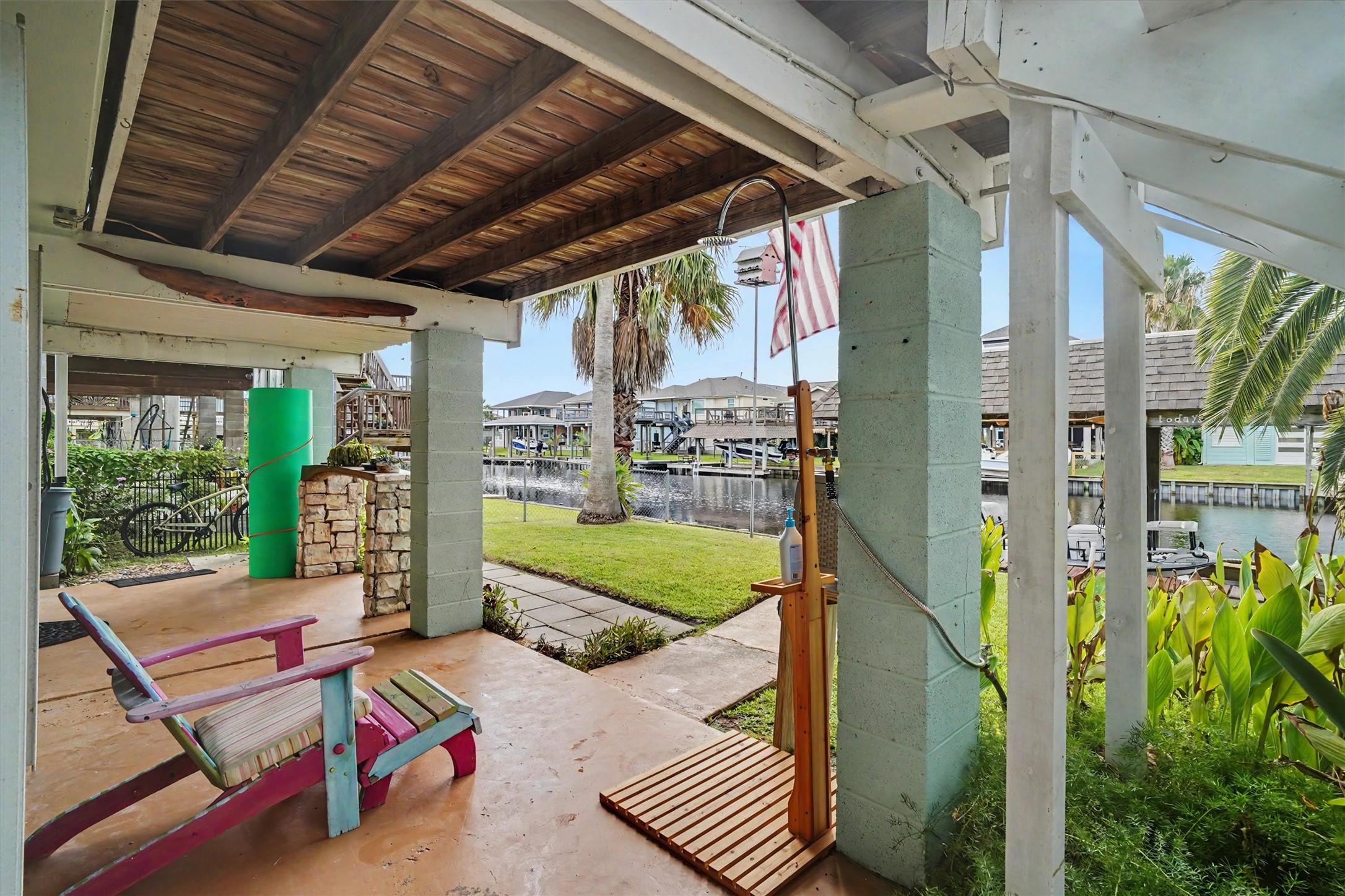 Your perfect afternoon hangouta spacious downstairs entertaining area with cool shady afternoons and beautiful waterfront views