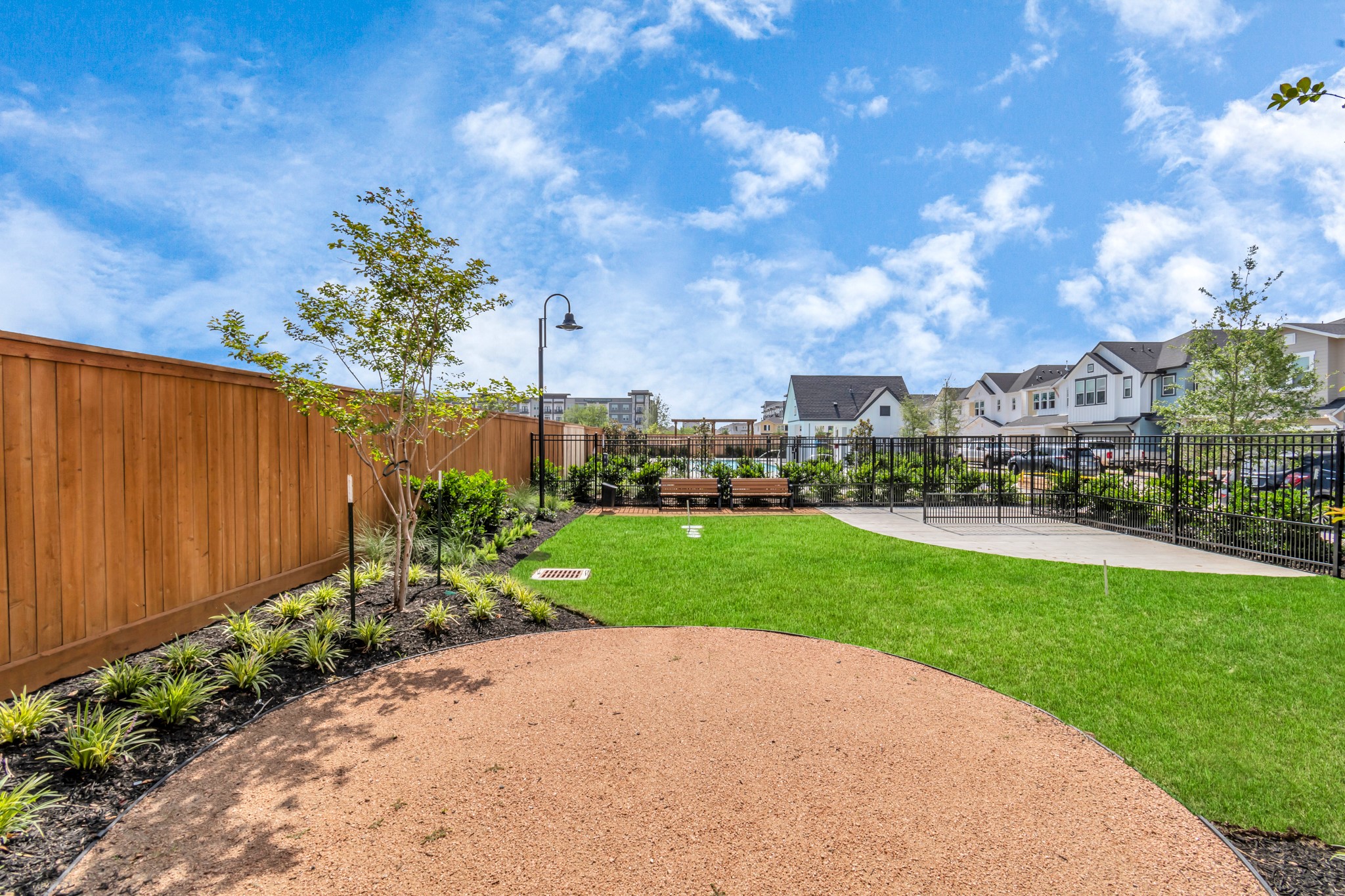 A Quaint Dog Park, as well as a Refreshing Resort-Style Pool Area,