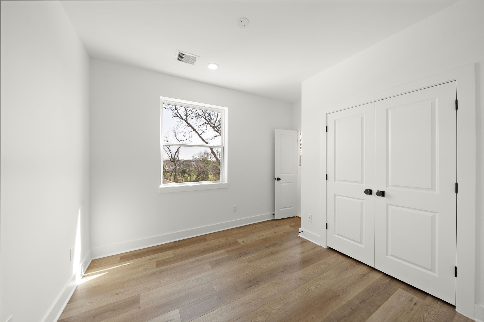 3rd Floor Bedroom with attached full bathroom