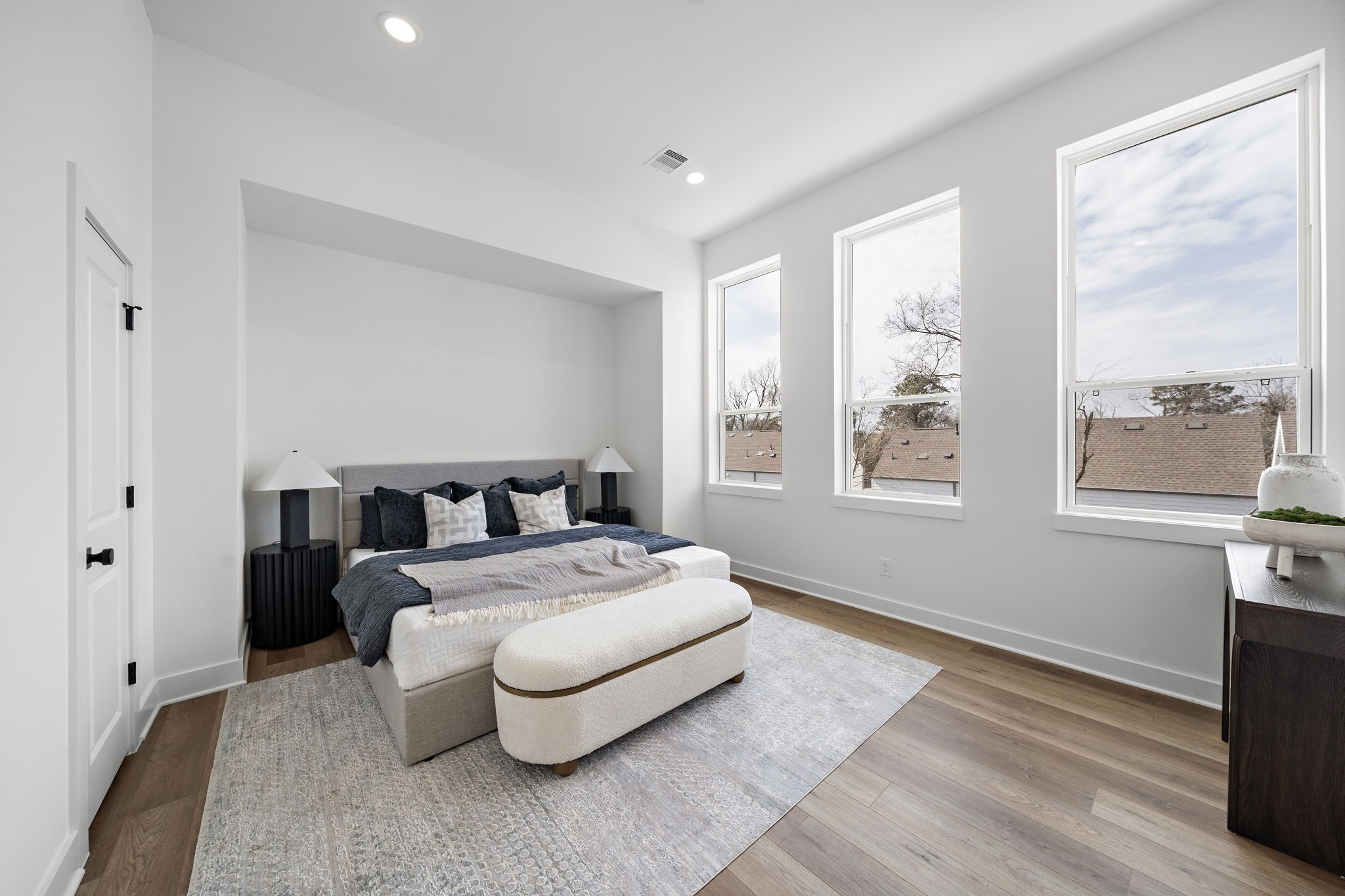 Luxurious primary suite featuring an expansive walk-in closet.